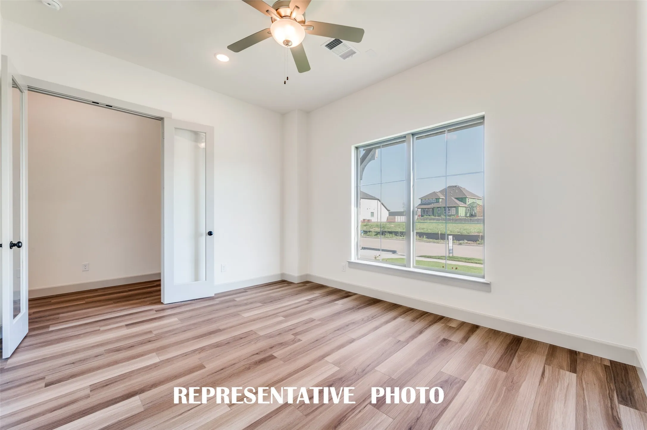 The gorgeous, light filled, private home office is the perfect place for work or play!  REPRESENTATIVE PHOTO
