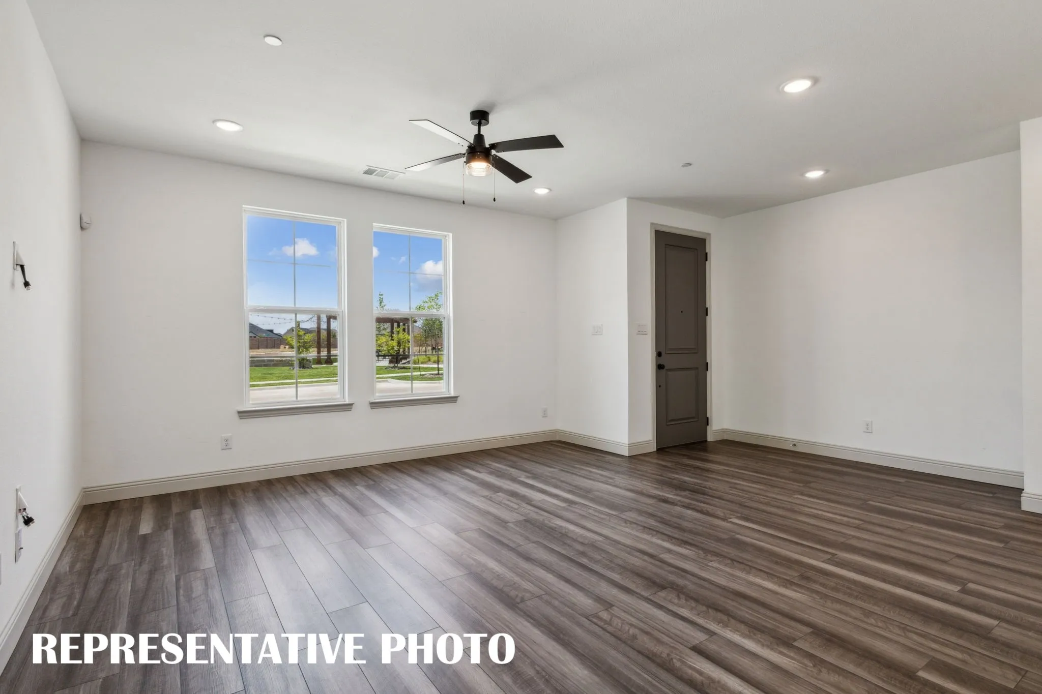 Welcome into your light filled family room!  REPRESENTATIVE PHOTO