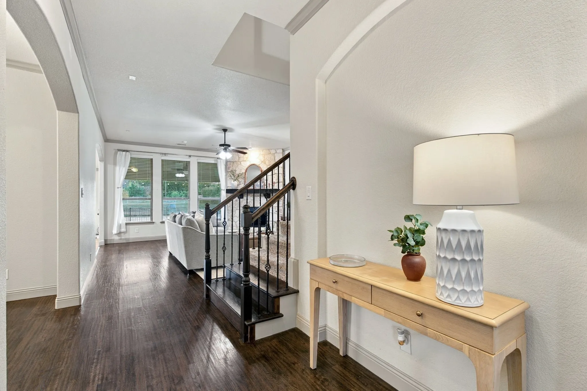 GREETED BY BEAUTIFUL WOOD FLOORS AS YOU FIRST WALK IN
