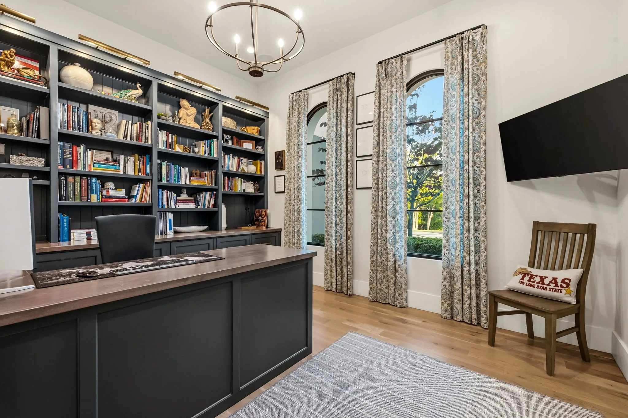 Built-in cabinetry with integrated shelving and task lighting