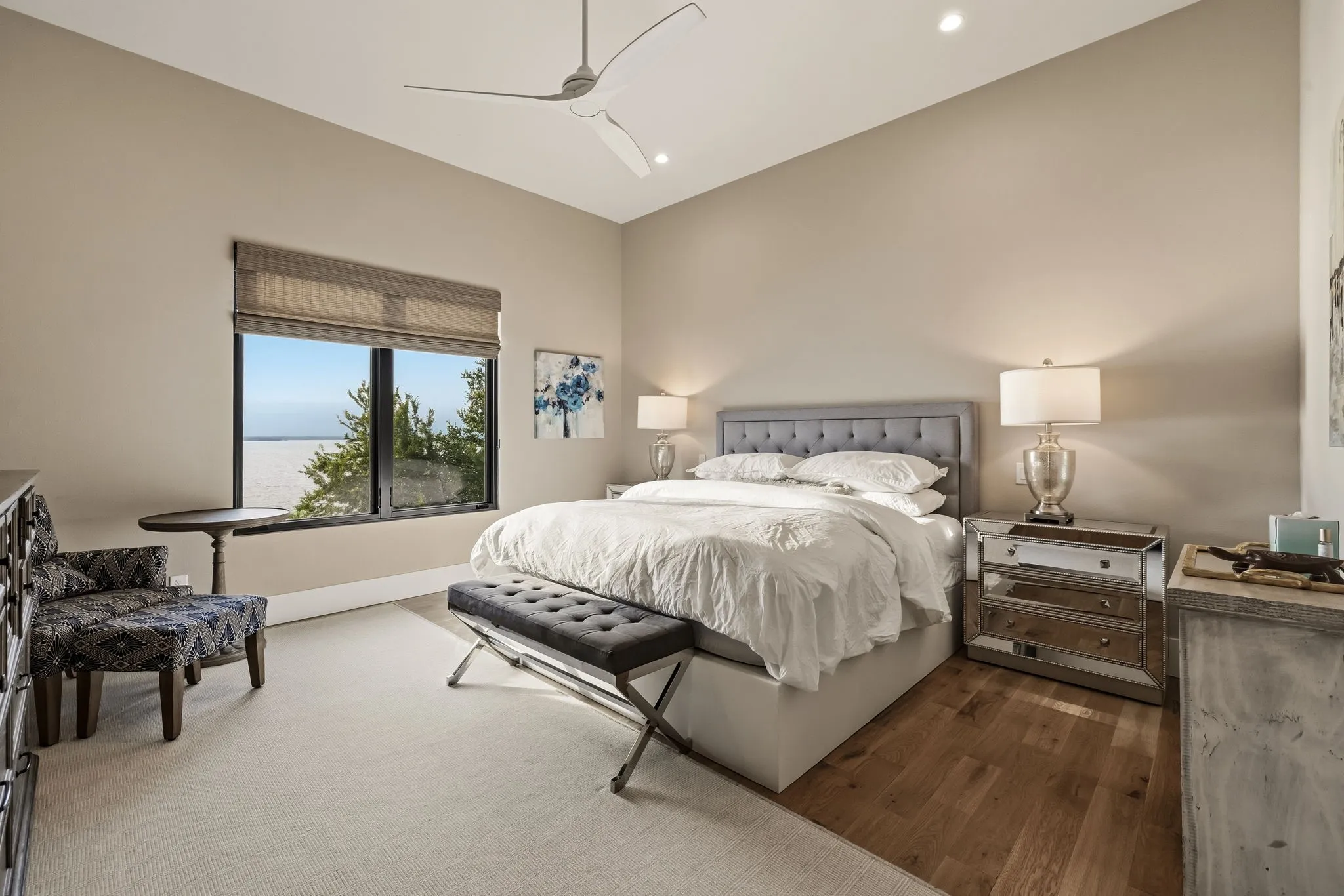 Hardwood flooring, recessed lighting, and a contemporary ceiling fan