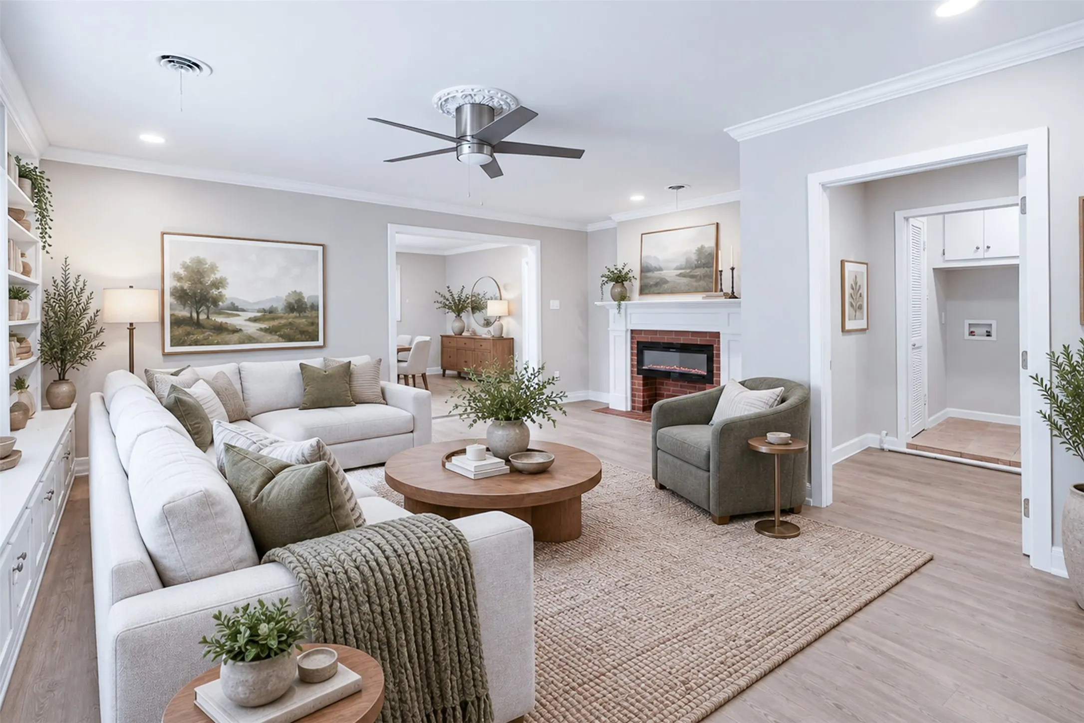 Recessed lighting, crown molding, wood-finish flooring, built-in shelving, and a ceiling fan