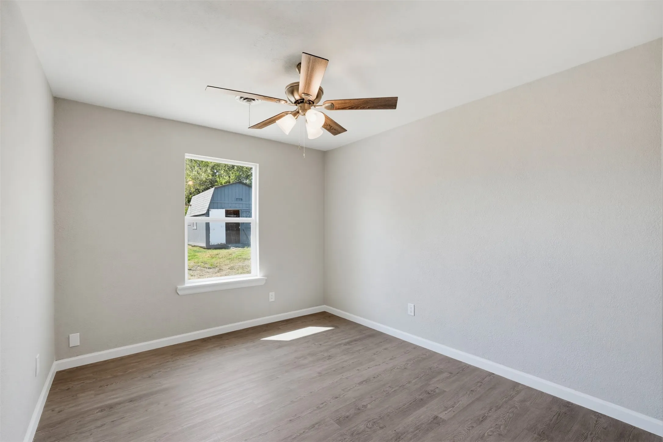 Wood-finish flooring with white trim