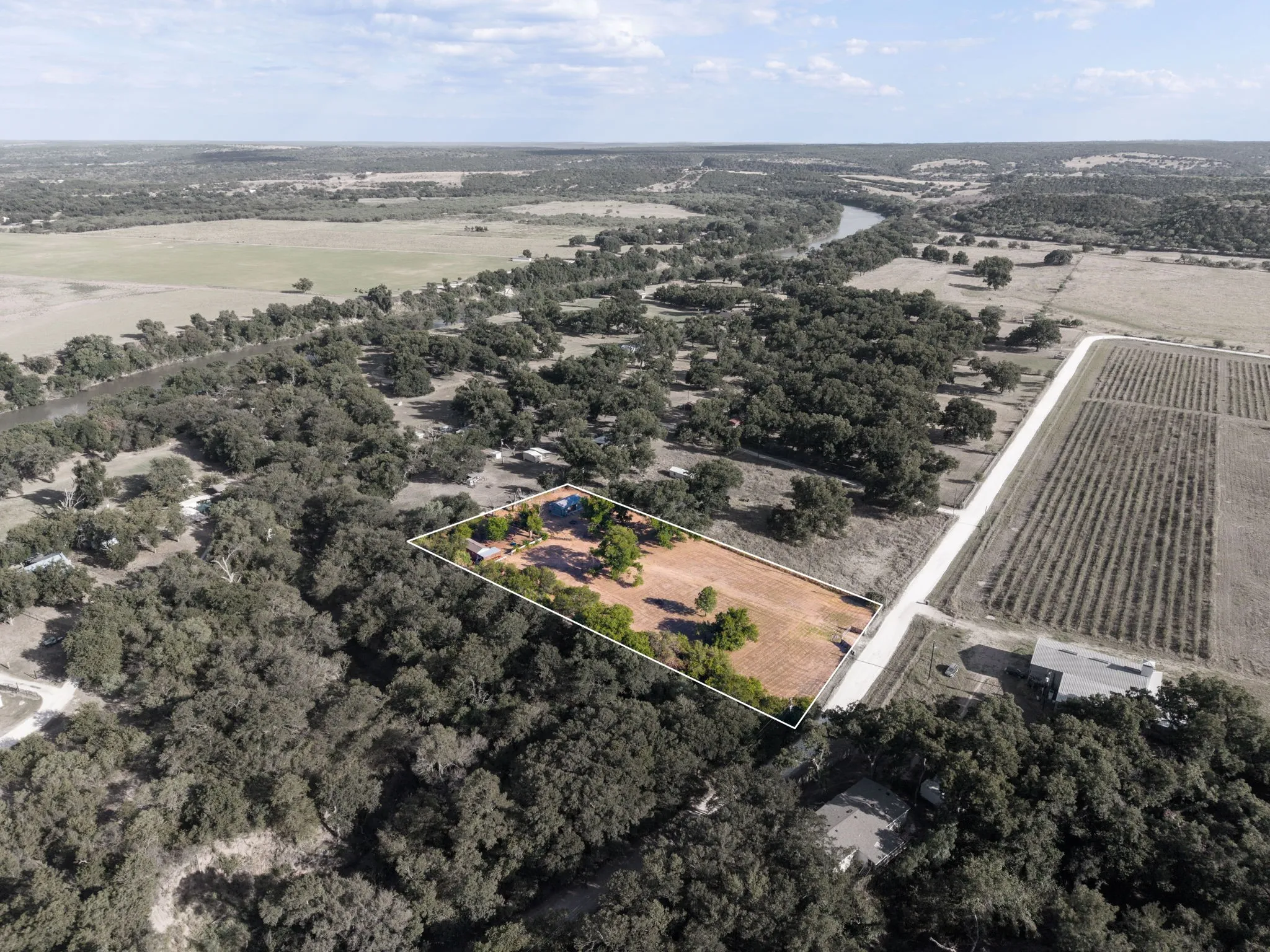 Expansive property with a defined boundary and residential structure
