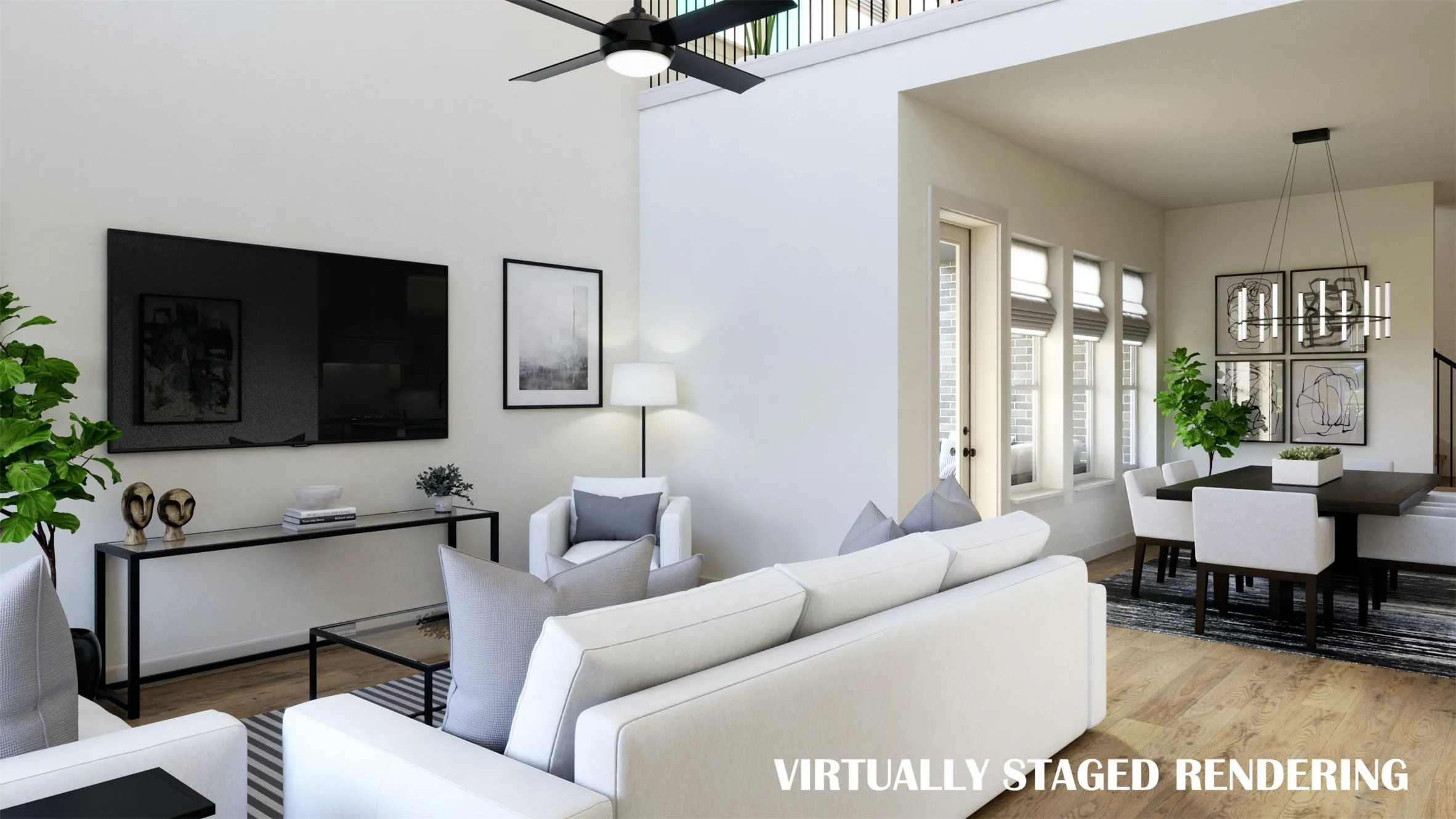 Open to the kitchen-dining areas and the upstairs game room, this family room was designed for today's active family lifestyle.  VIRTUALLY STAGED RENDERING