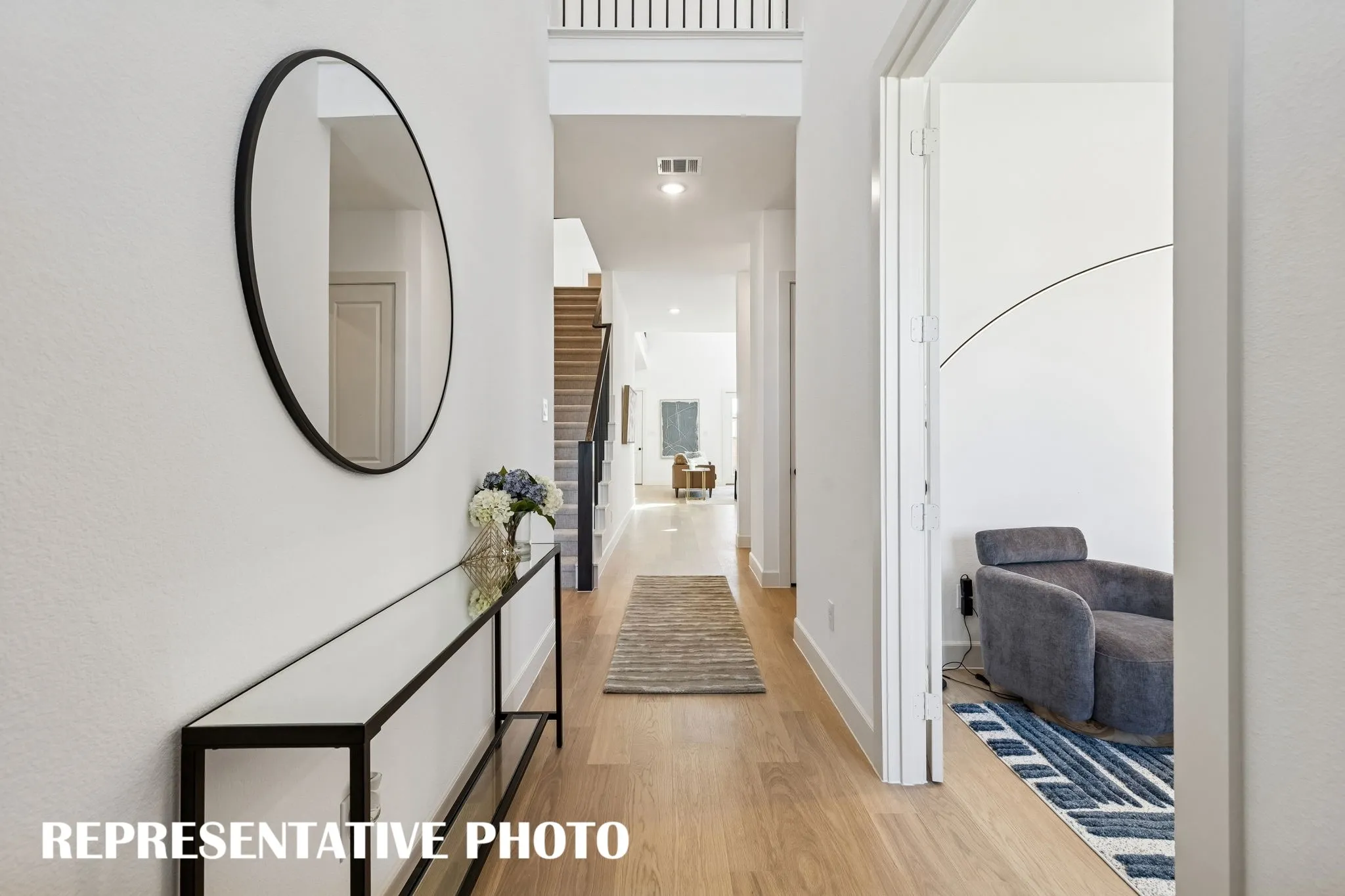 With sight lines from the front through to the rear of the home and ample space to display art work, our Marcel II plan offers the perfect entry for you to welcome friends and family into your new dream home!  REPRESENTATIVE PHOTO