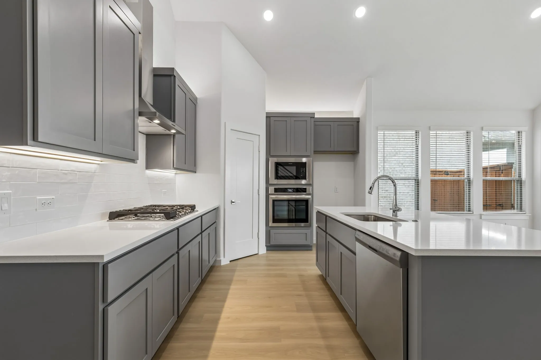 Kitchen in the Claret home plan – REPRESENTATIVE PHOTO