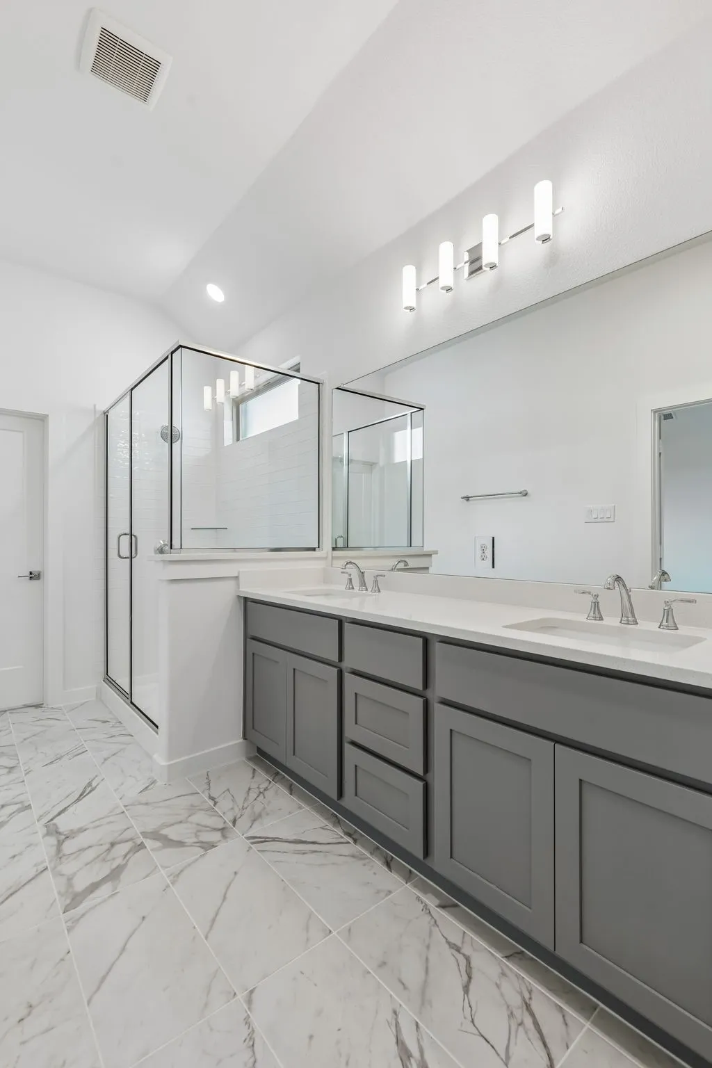 Primary Bathroom in the Claret home plan – REPRESENTATIVE PHOTO