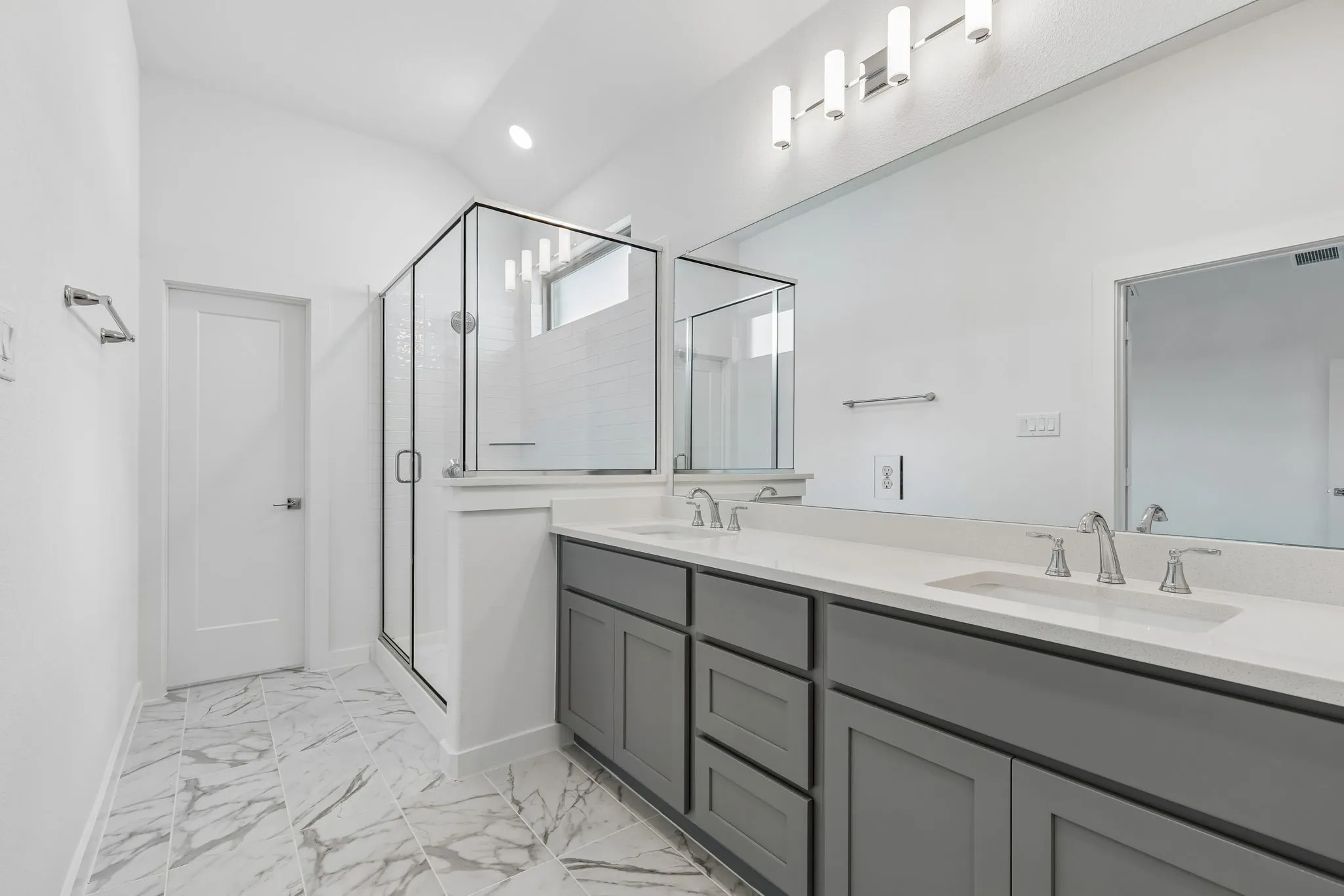 Primary Bathroom in the Claret home plan – REPRESENTATIVE PHOTO