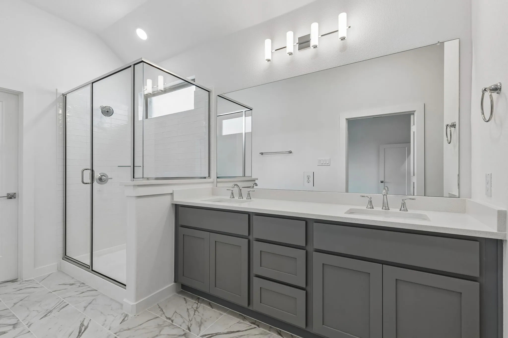 Primary Bathroom in the Claret home plan – REPRESENTATIVE PHOTO