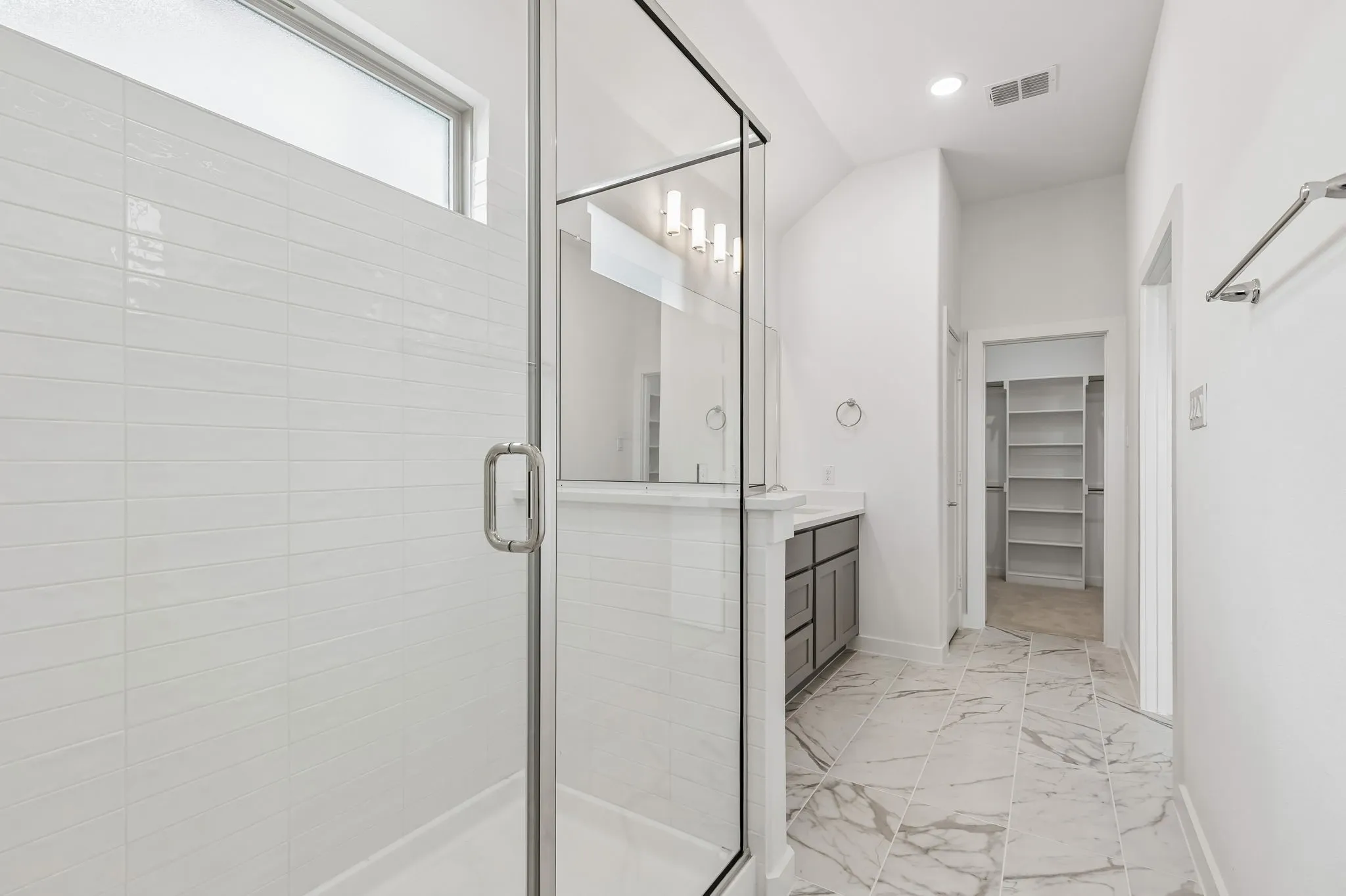 Primary Bathroom in the Claret home plan – REPRESENTATIVE PHOTO