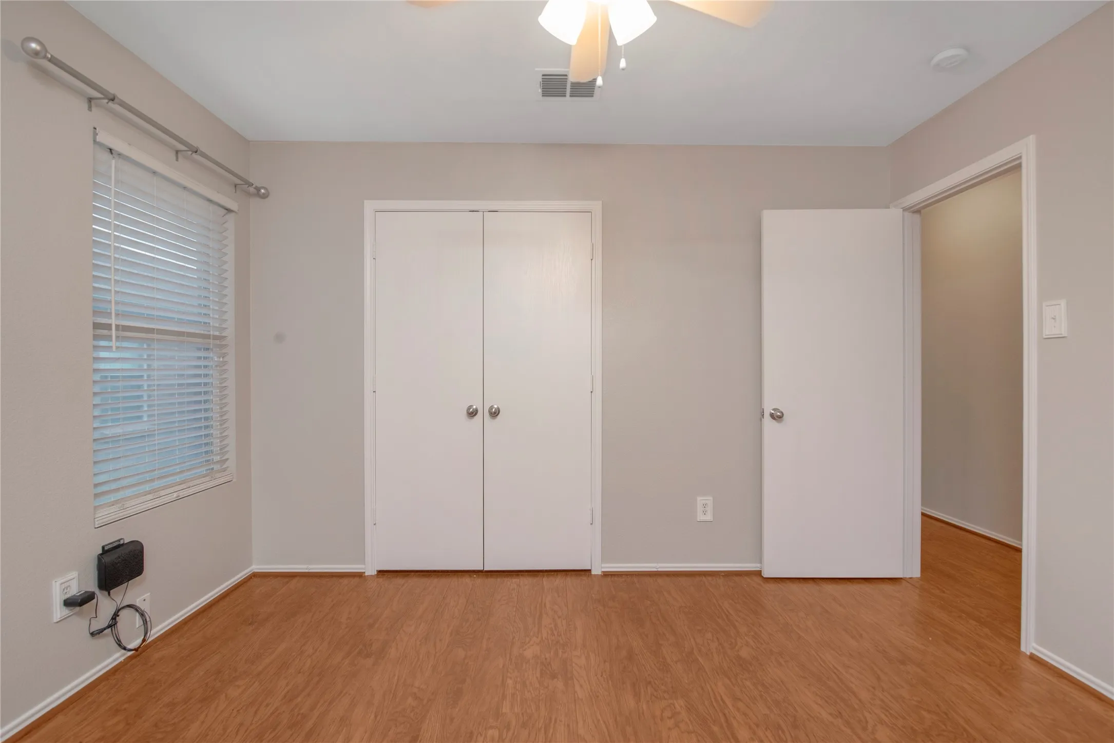 Wood-finish flooring with neutral wall paint