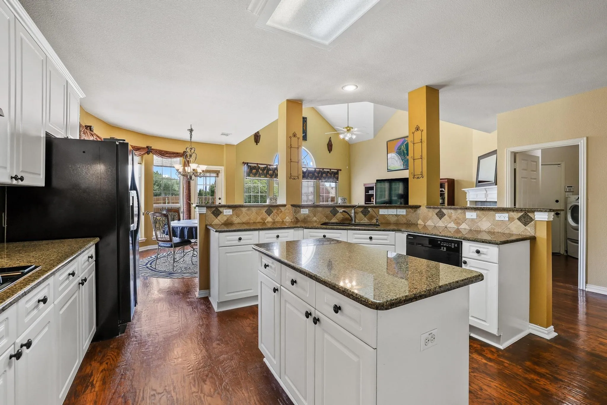 Spacious kitchen overlooks the family room