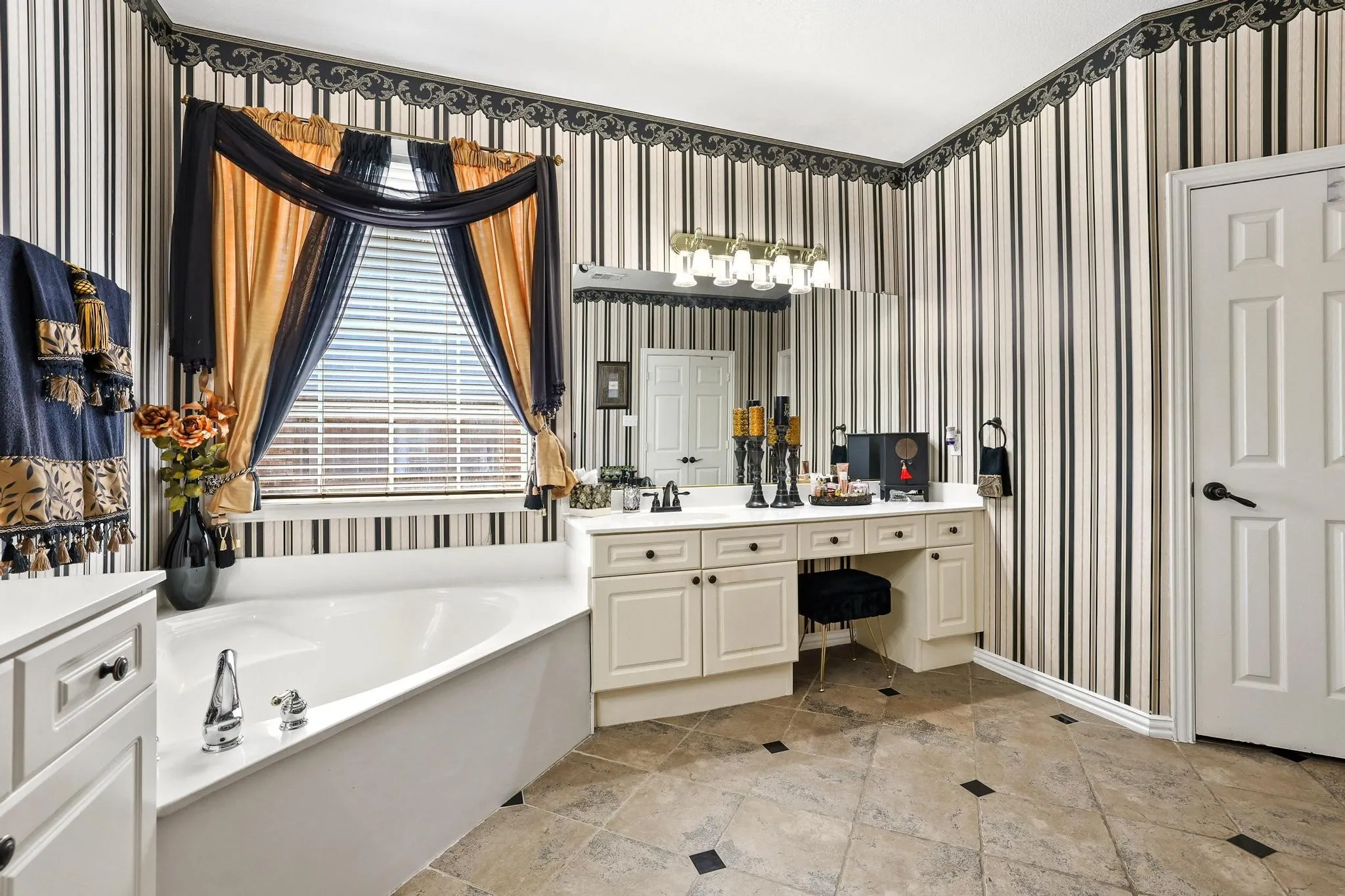 Garden tub provides a great spot to soak and relax!