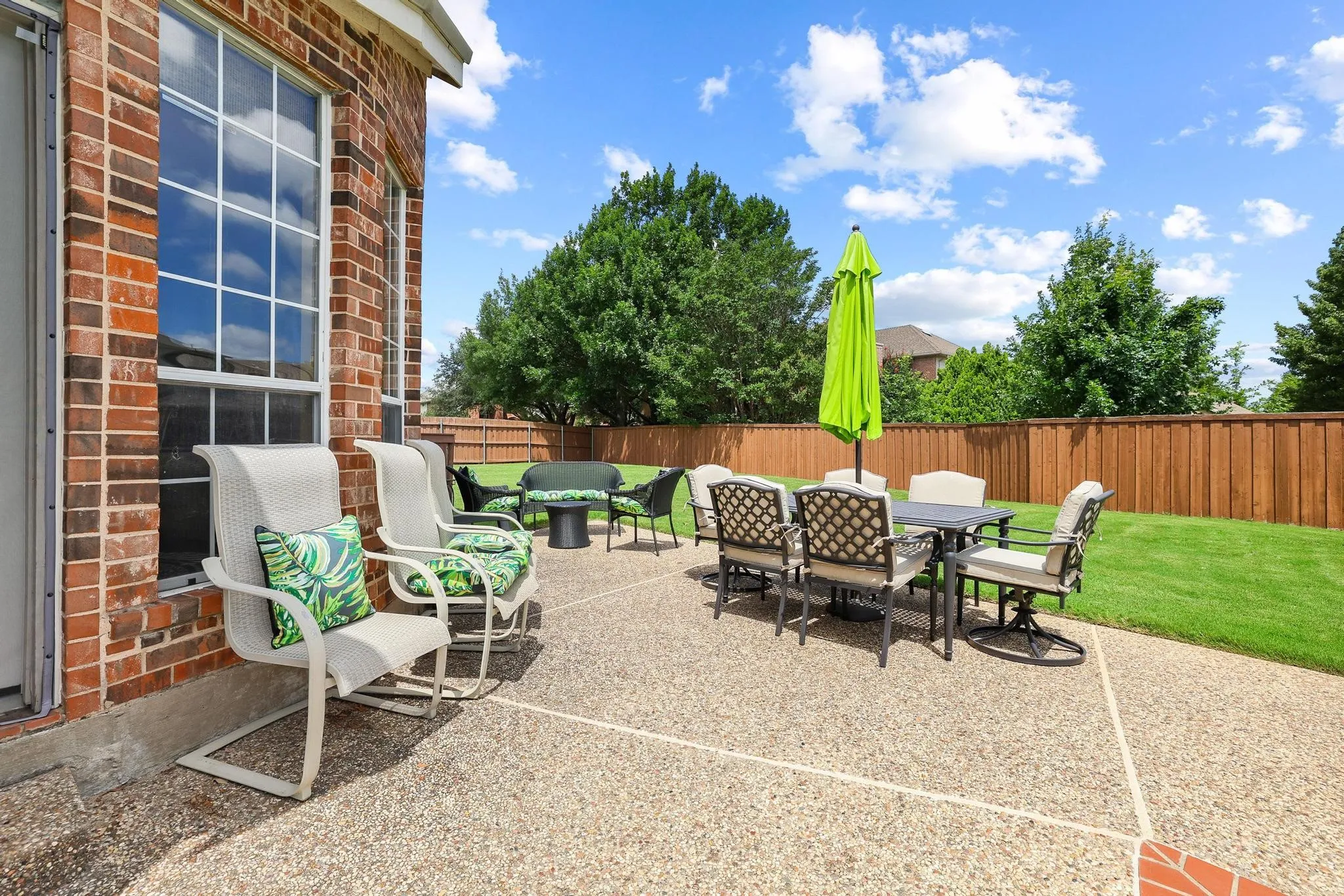 Open patio by the pool is great for entertaining