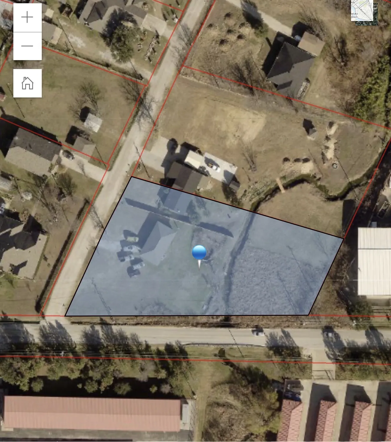 Aerial Map. Displaying an overhead view with a highlighted property boundary