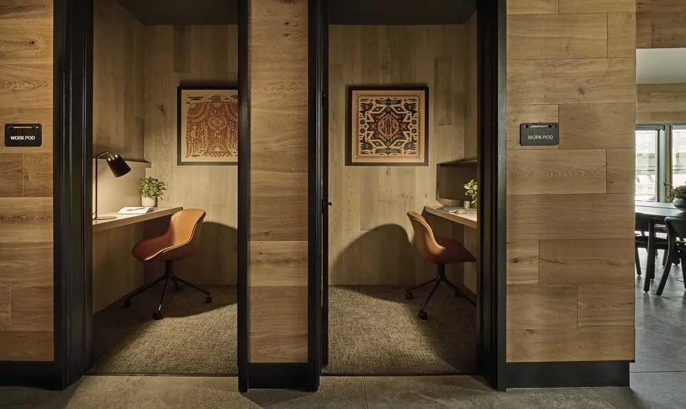 Home office featuring wooden walls