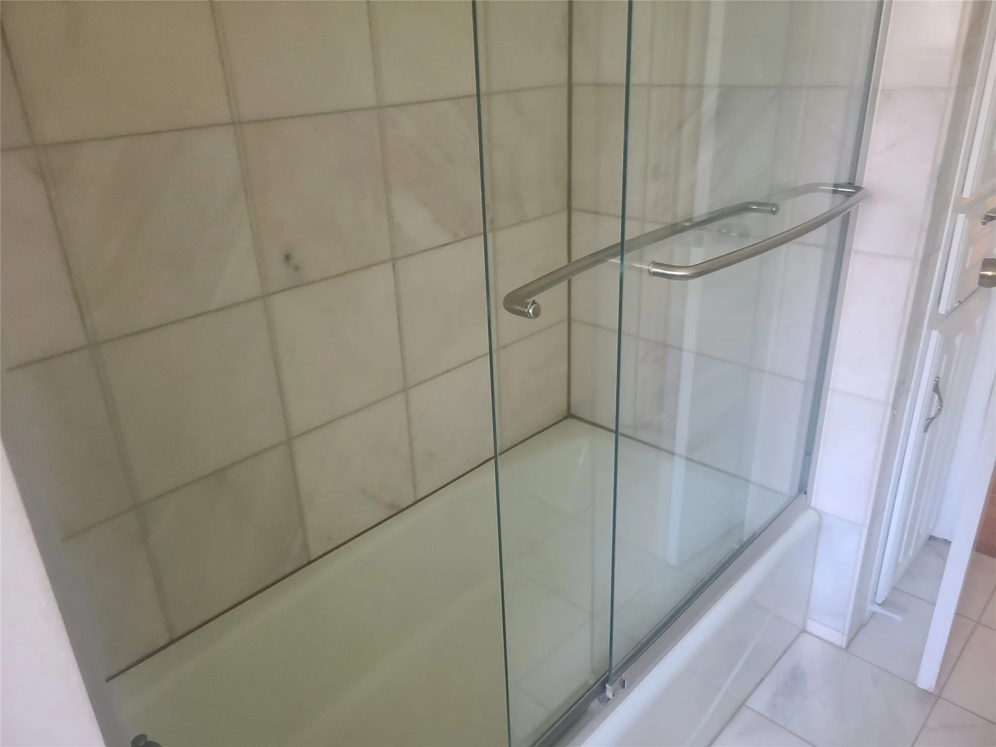 Bathroom with sliding shower door