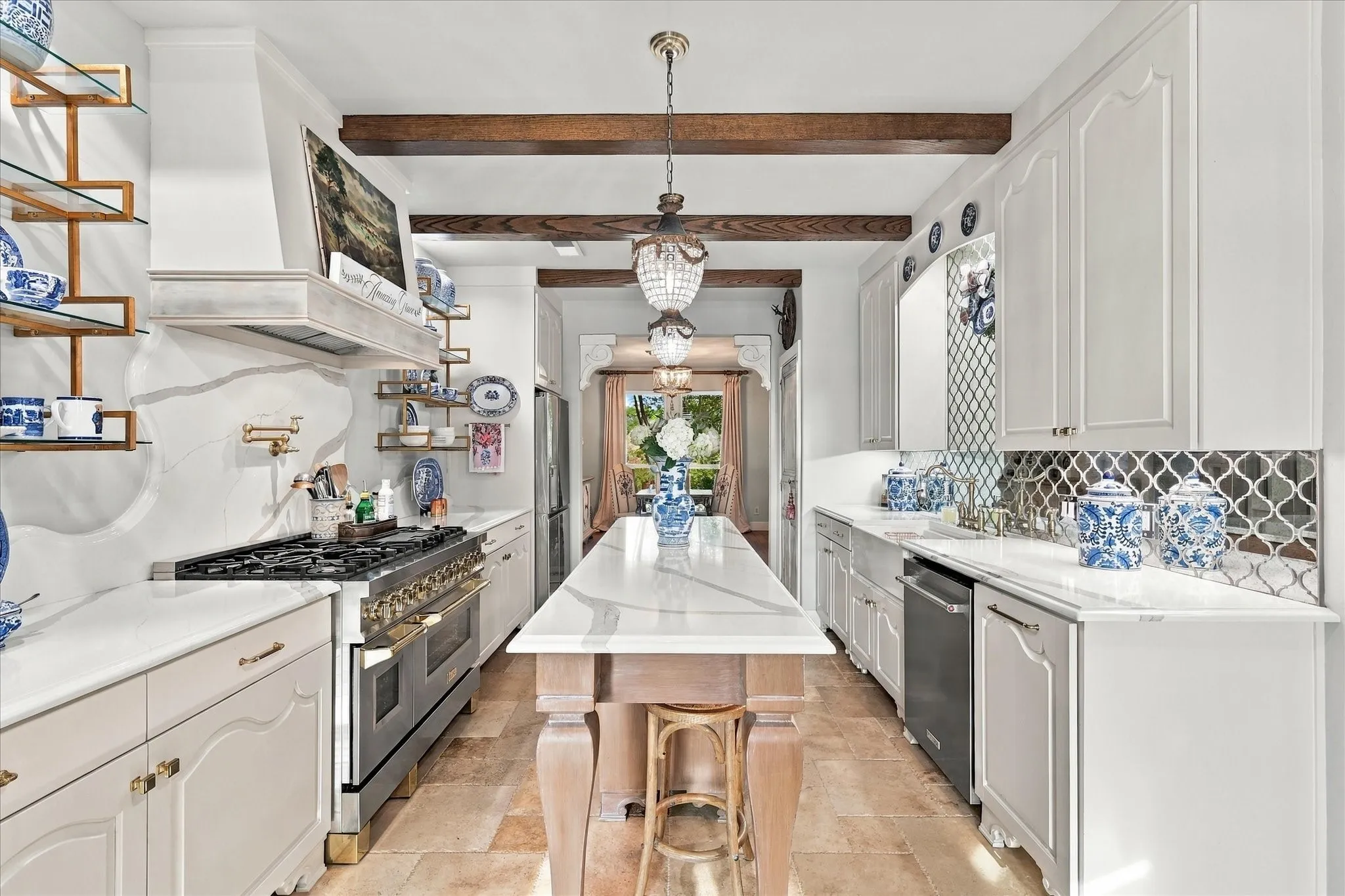 Kitchen also features all new appliances, ceramic farm sink, crystal chandeliers and designer backsplash.