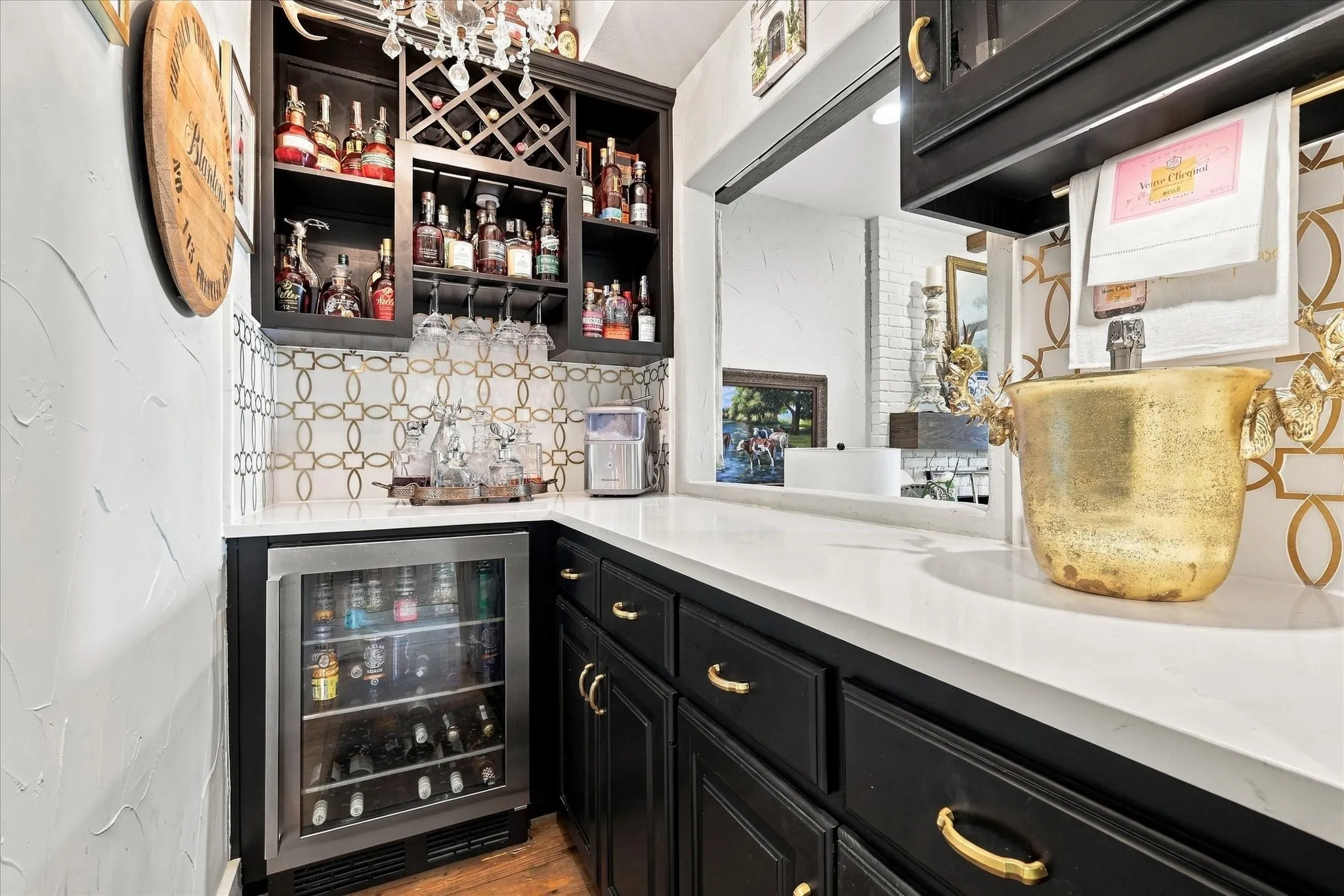 New remodeled Bourbon Bar with new countertops, wine cooler, new cabintry w custom pull handles and new designer backsplash