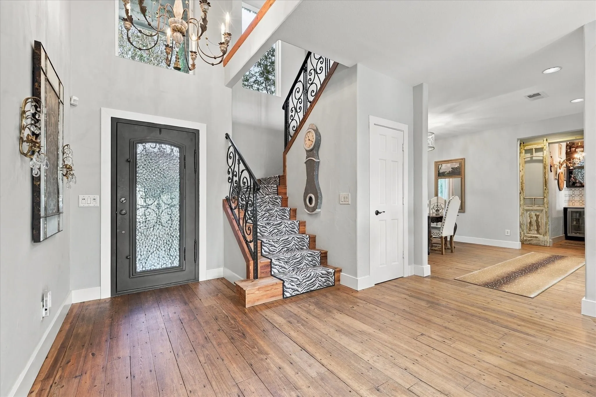 Enter in to a completely remodeled home featuring wood floors, zebra carpet on stairs, new light fixtures and the entire interior has been painted.