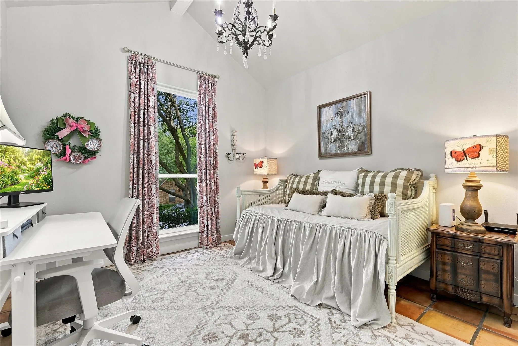 Downstairs secondary bedroom #2 with adjacent full bath. Current owners use this space as an office area with day bed.