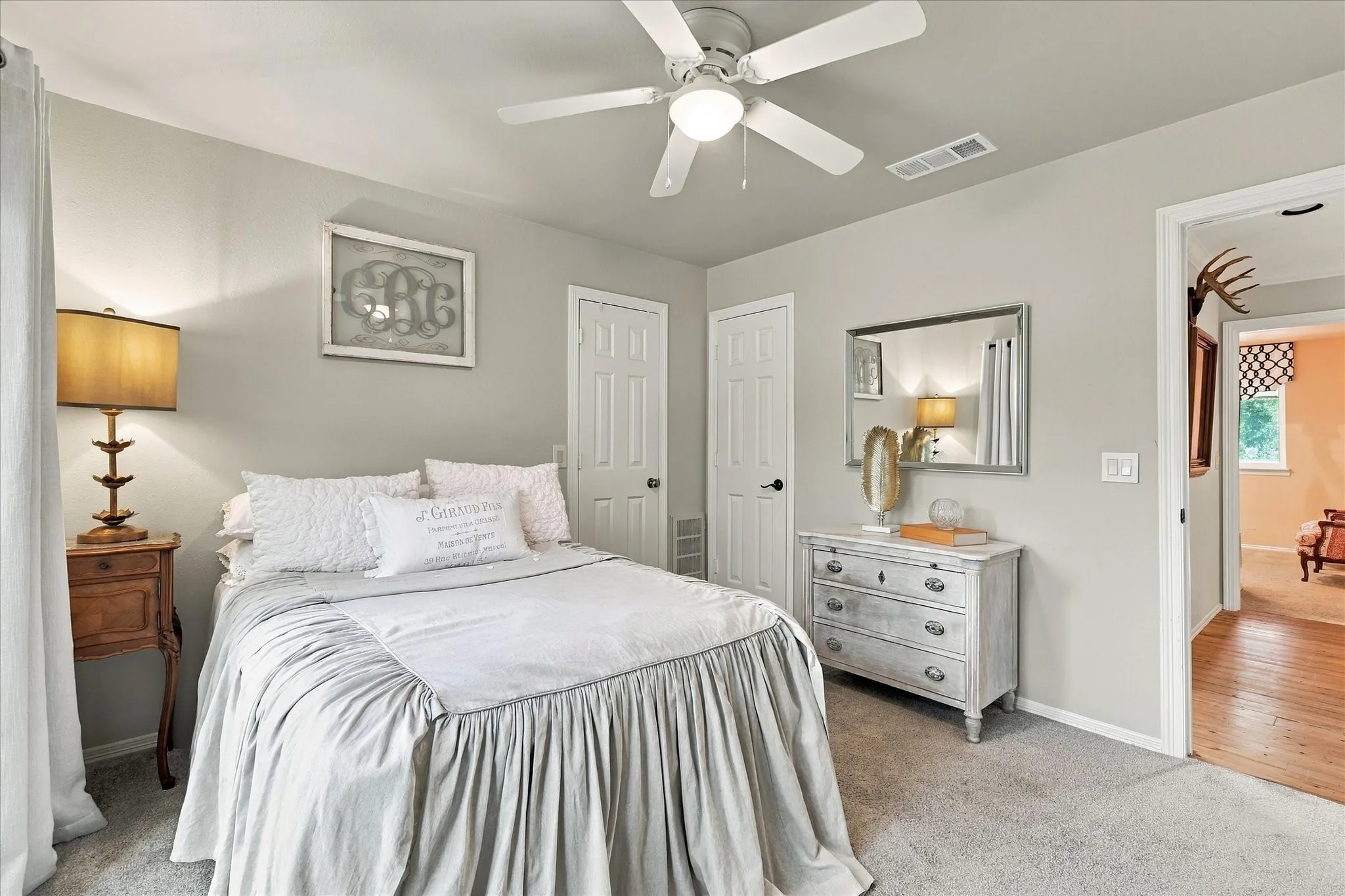 Upstairs bedroom #3 with ensuite. Updated features include new carpet, paint, windows and ceiling fan