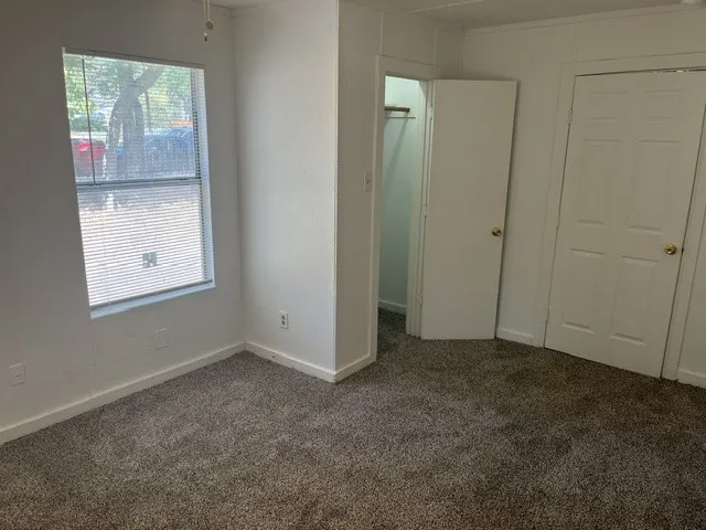 Wall-to-wall carpeting throughout