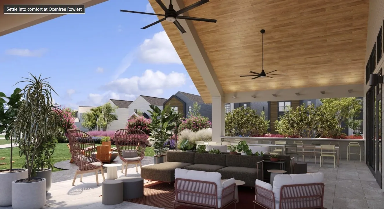 View of patio with an outdoor hangout area and ceiling fan