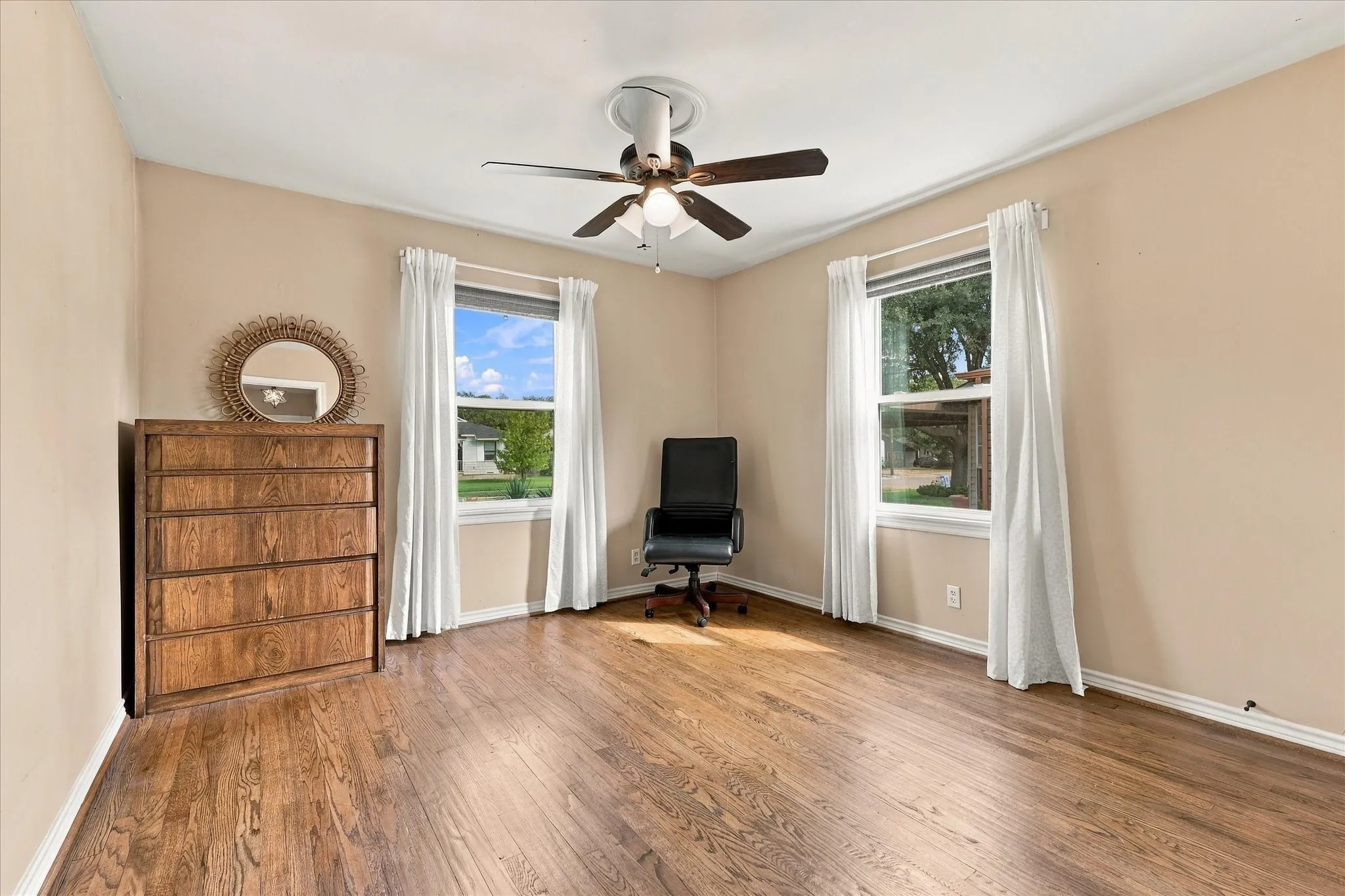 Front bedroom also has new windows and hardwood floors