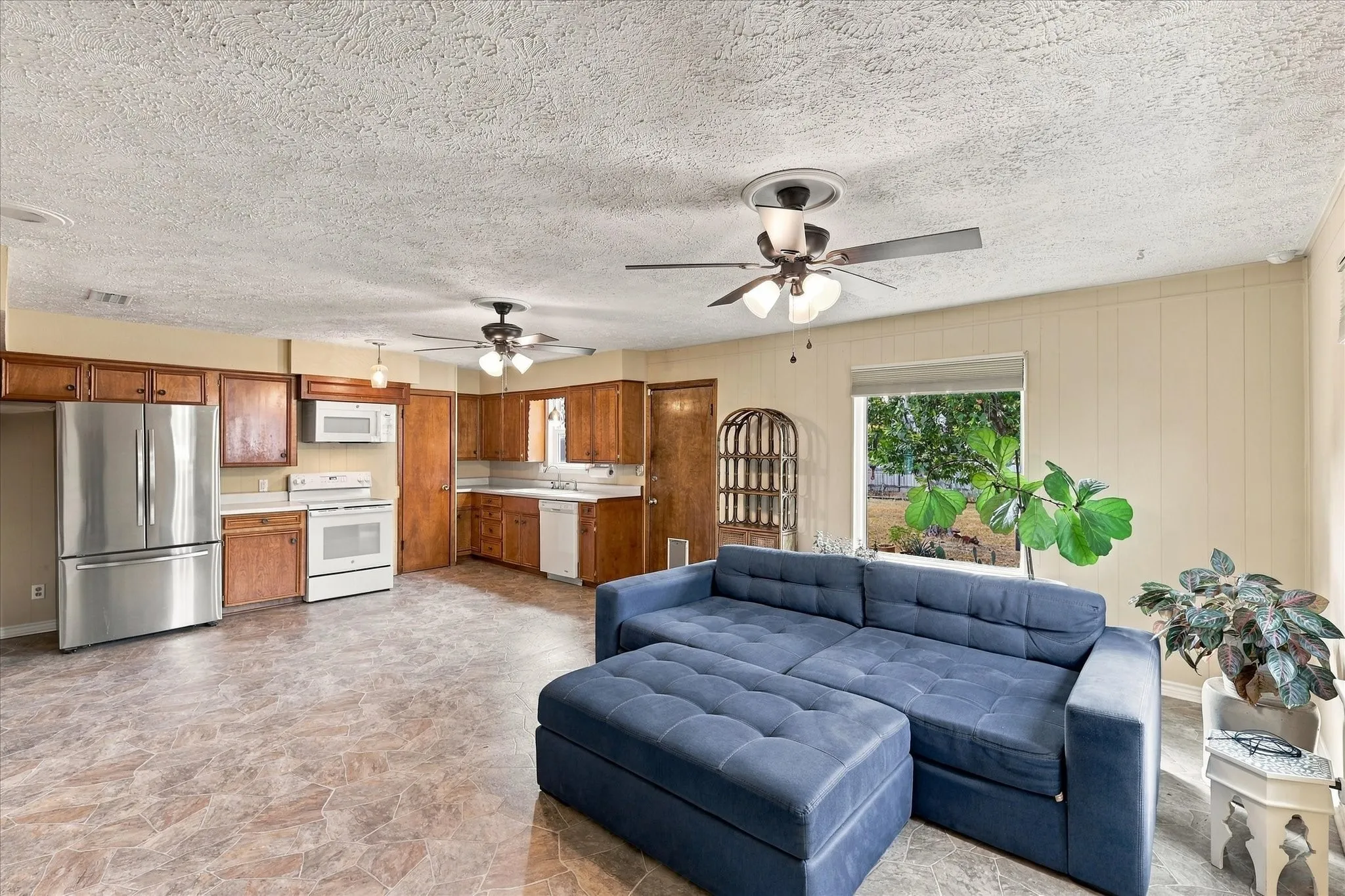 Open floor plan allows seamless flow from family room to kitchen