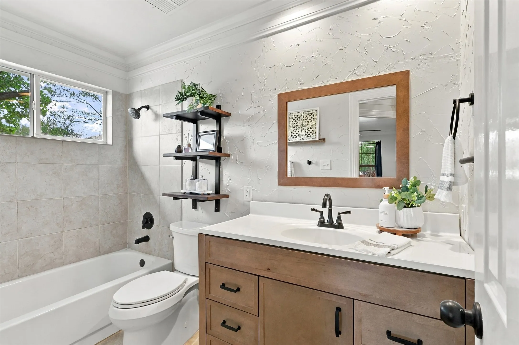 White bathtub and toilet