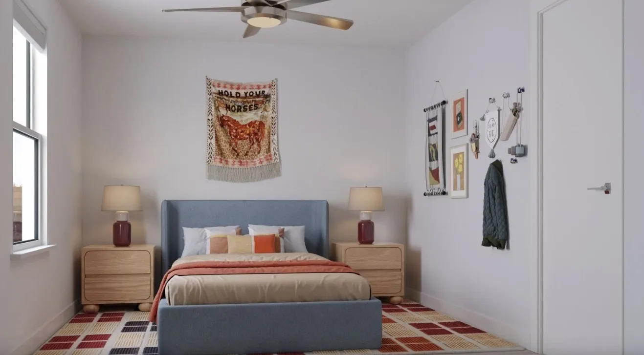 Bedroom with a ceiling fan and baseboards