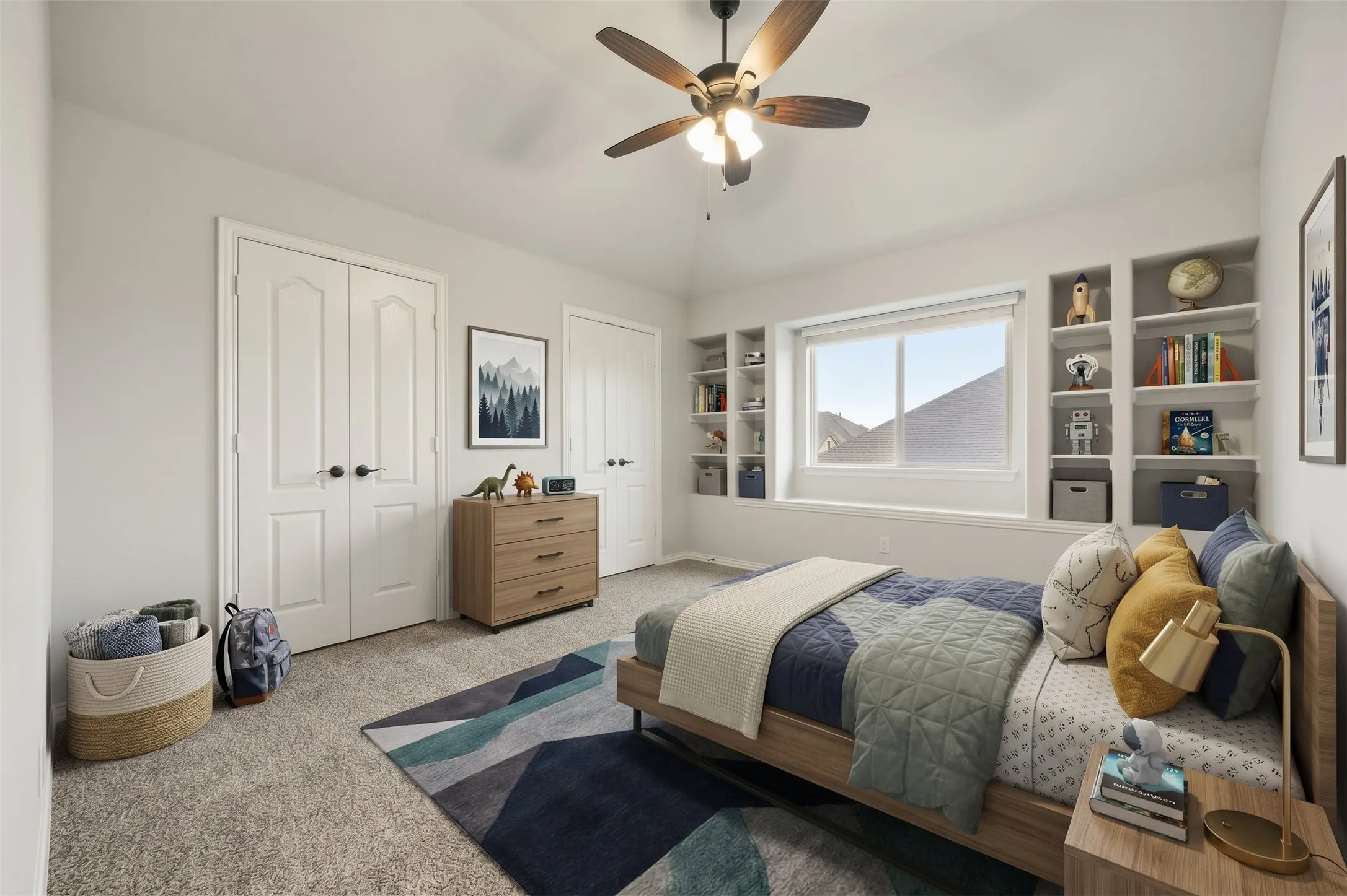 Sloped ceiling with ceiling fan, recessed built-in shelving, window with roller shade, and light-colored carpeting