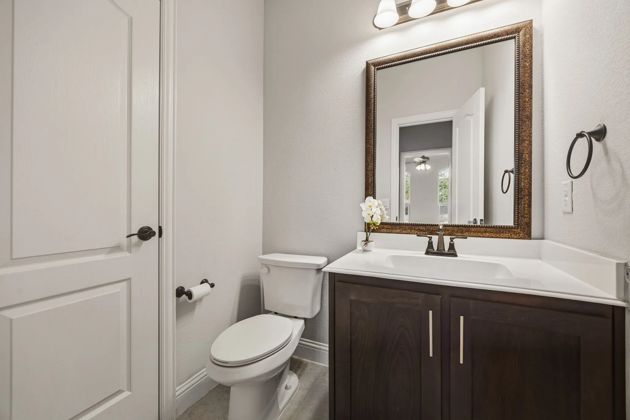 First floor half bath with linen closet