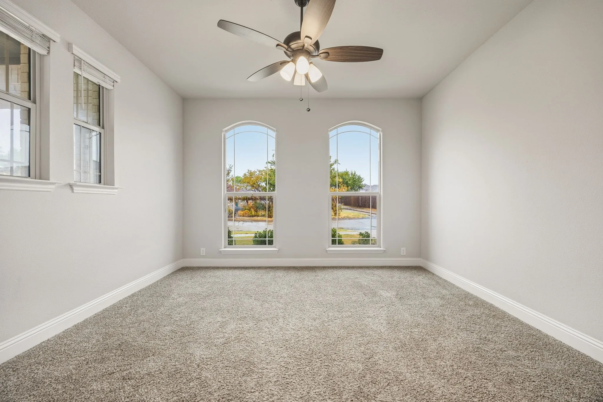 First floor bedroom facing the front of the home