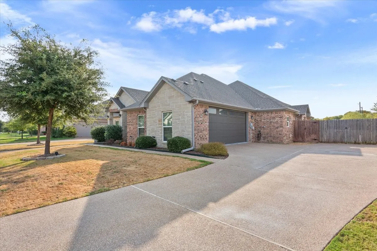 Brick and stone exterior with gabled roof lines