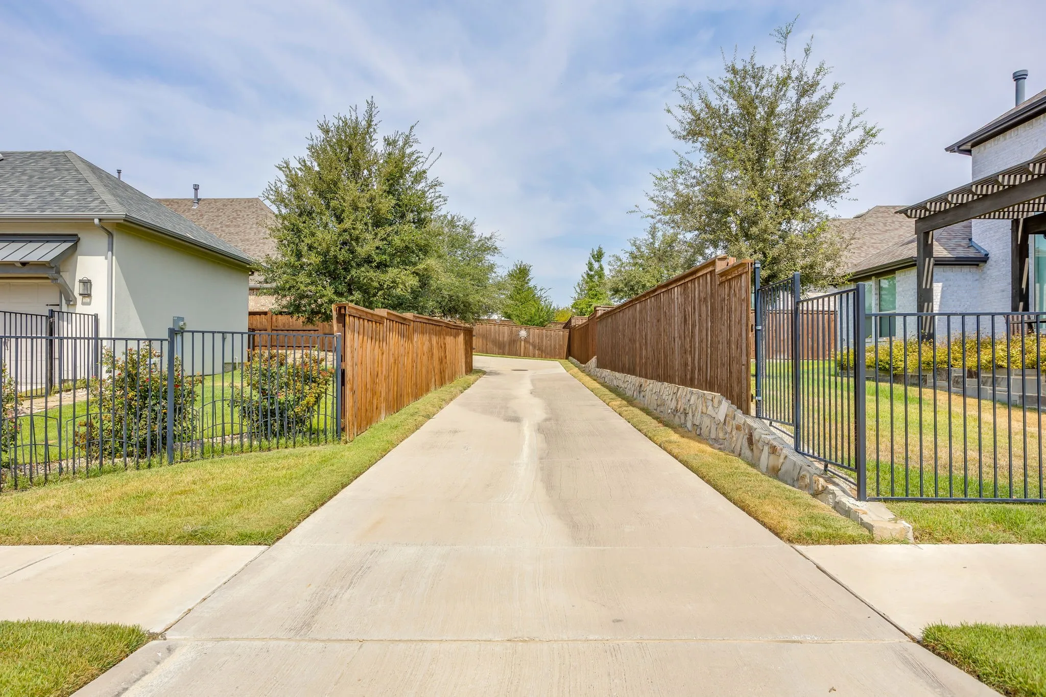 Driveway leading to the three car garage