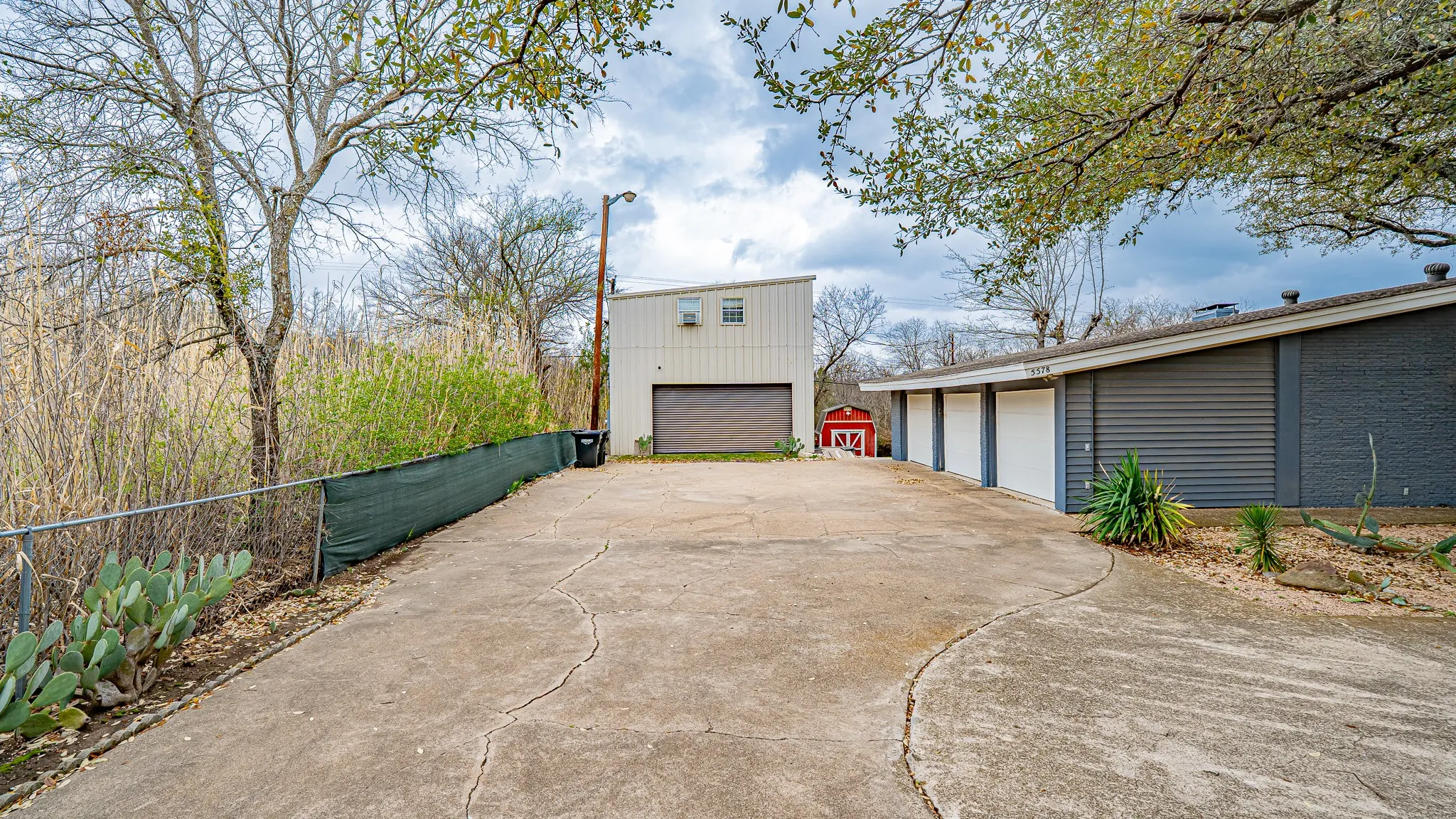 3 car garage and separate apartment, studio and rifle range