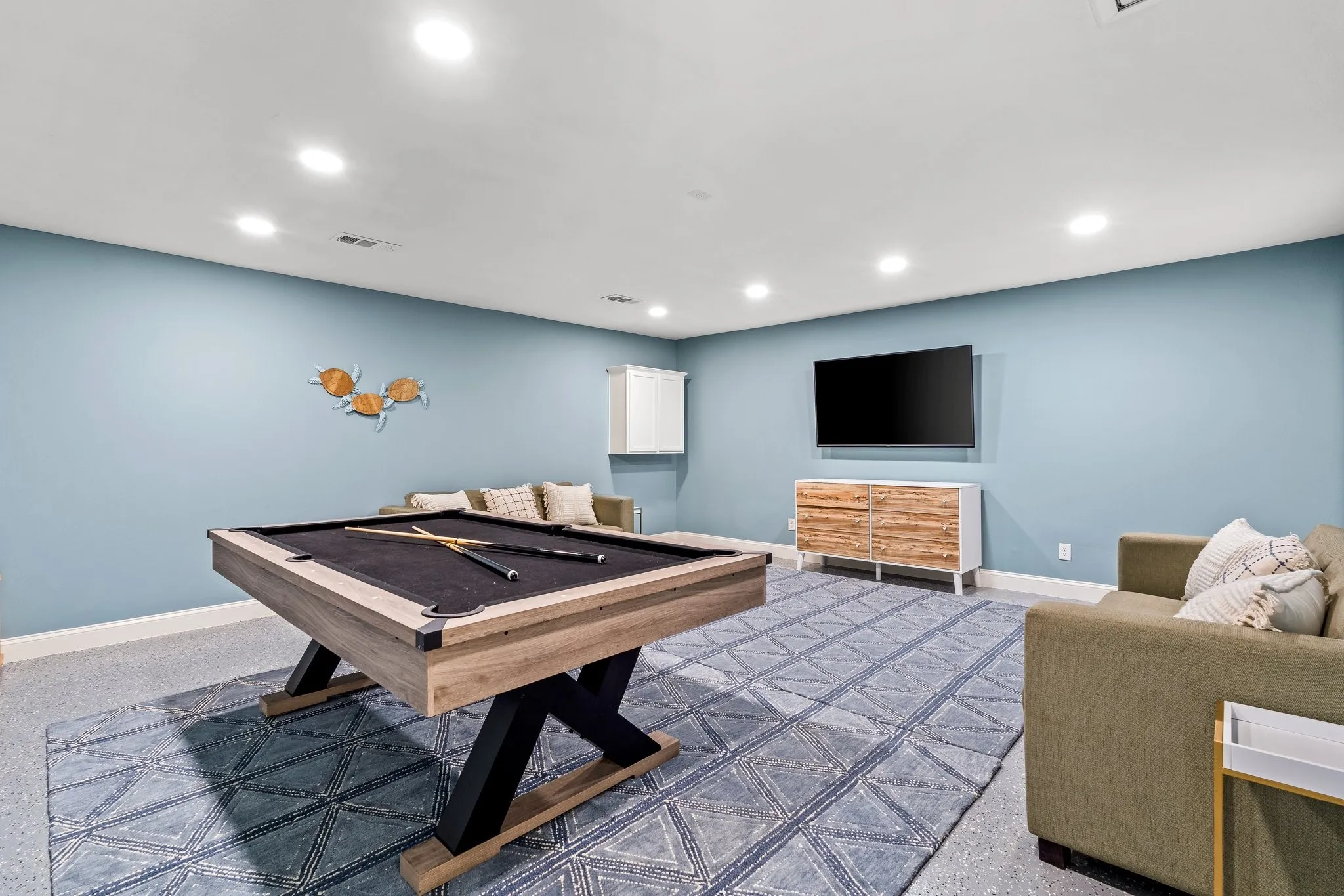 Garage conversion into game room.