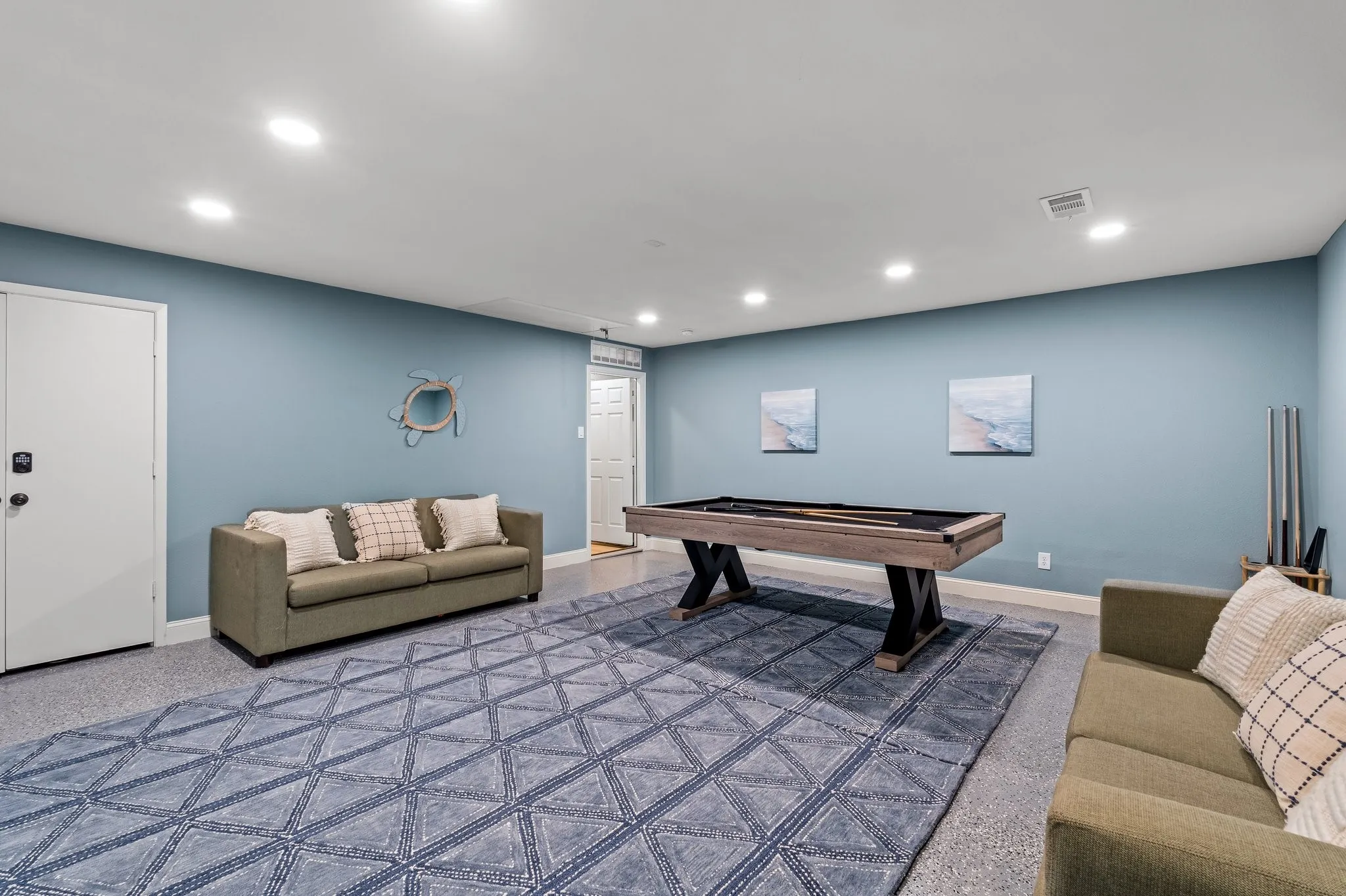 garage conversion into game room.