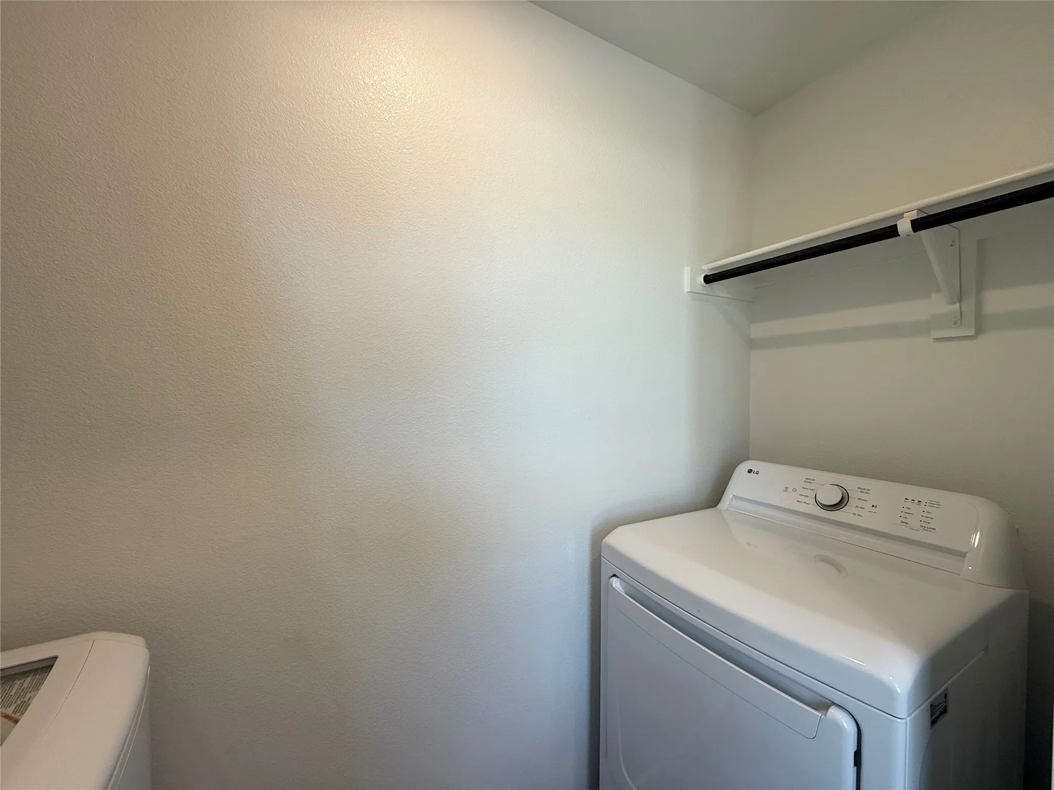 Built-in shelving with a hanging rod