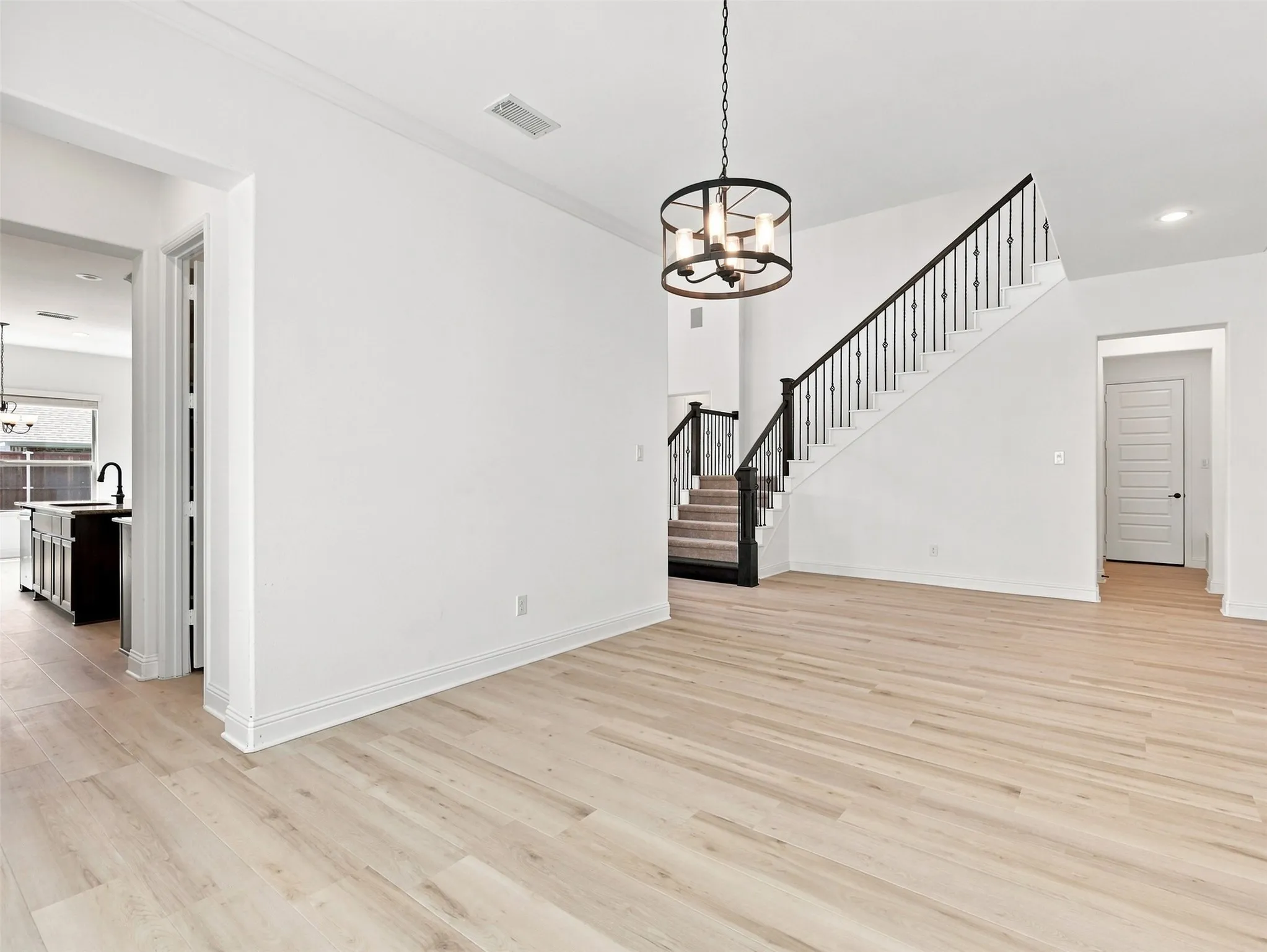 Upgraded lighting fixture which matches the theme of the home!