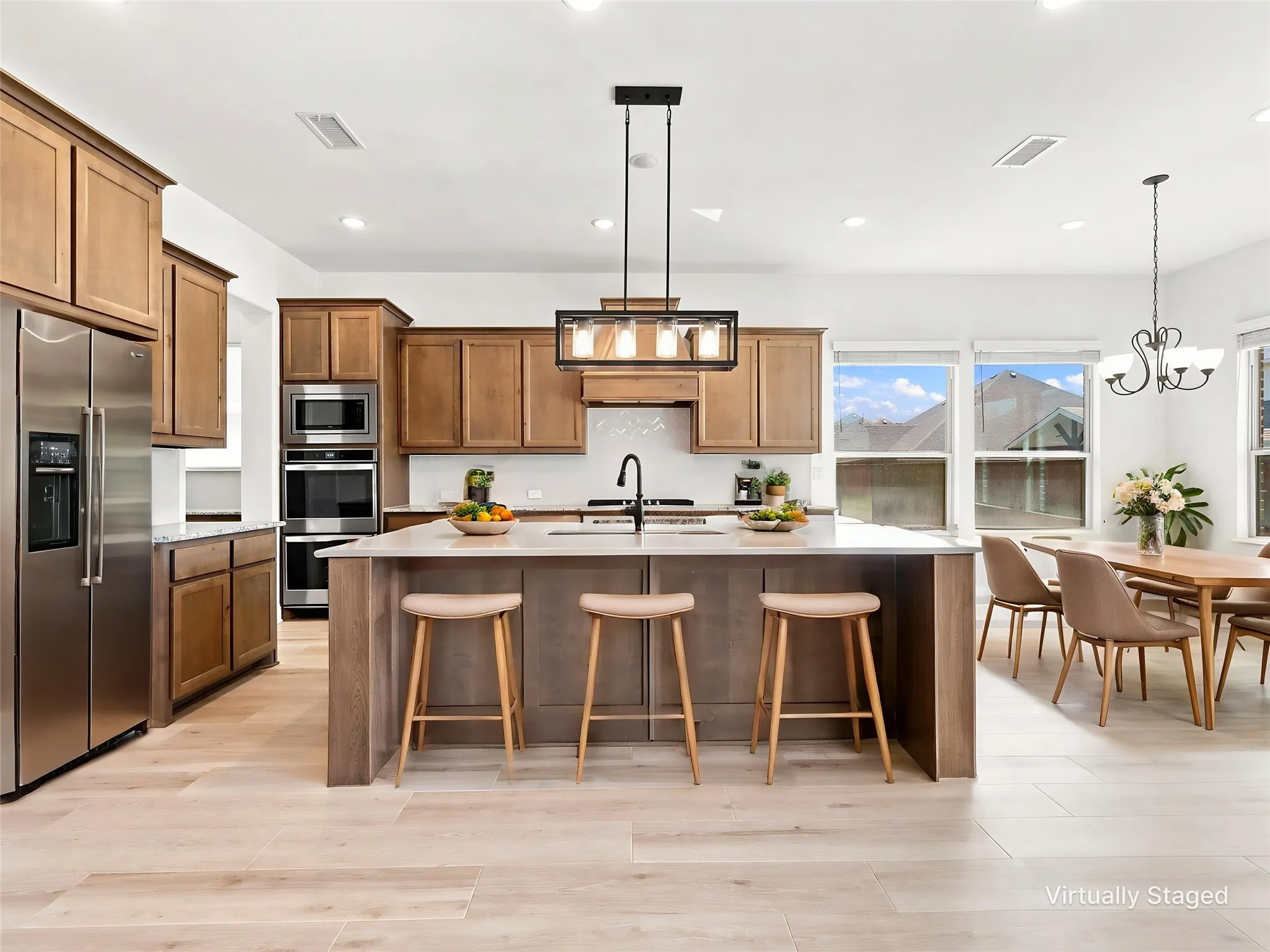 Enormous ktichen island provides additional seating and plenty of room for entertaining!