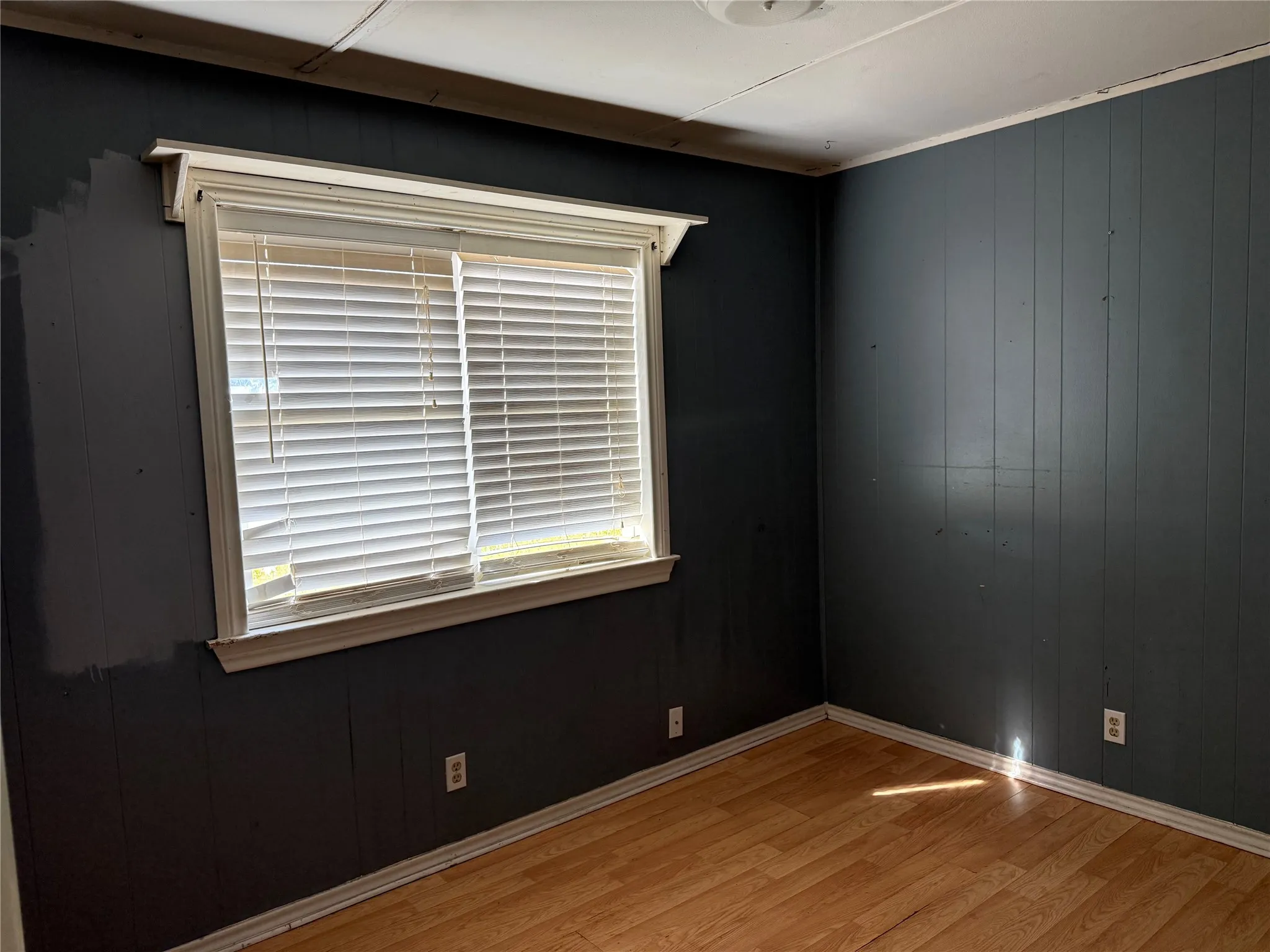 Wood-finish flooring with white trim