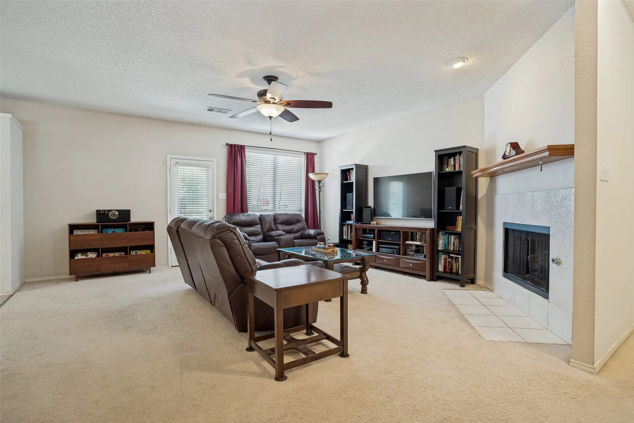 This living room is both spacious and cozy. Great for entertaining!