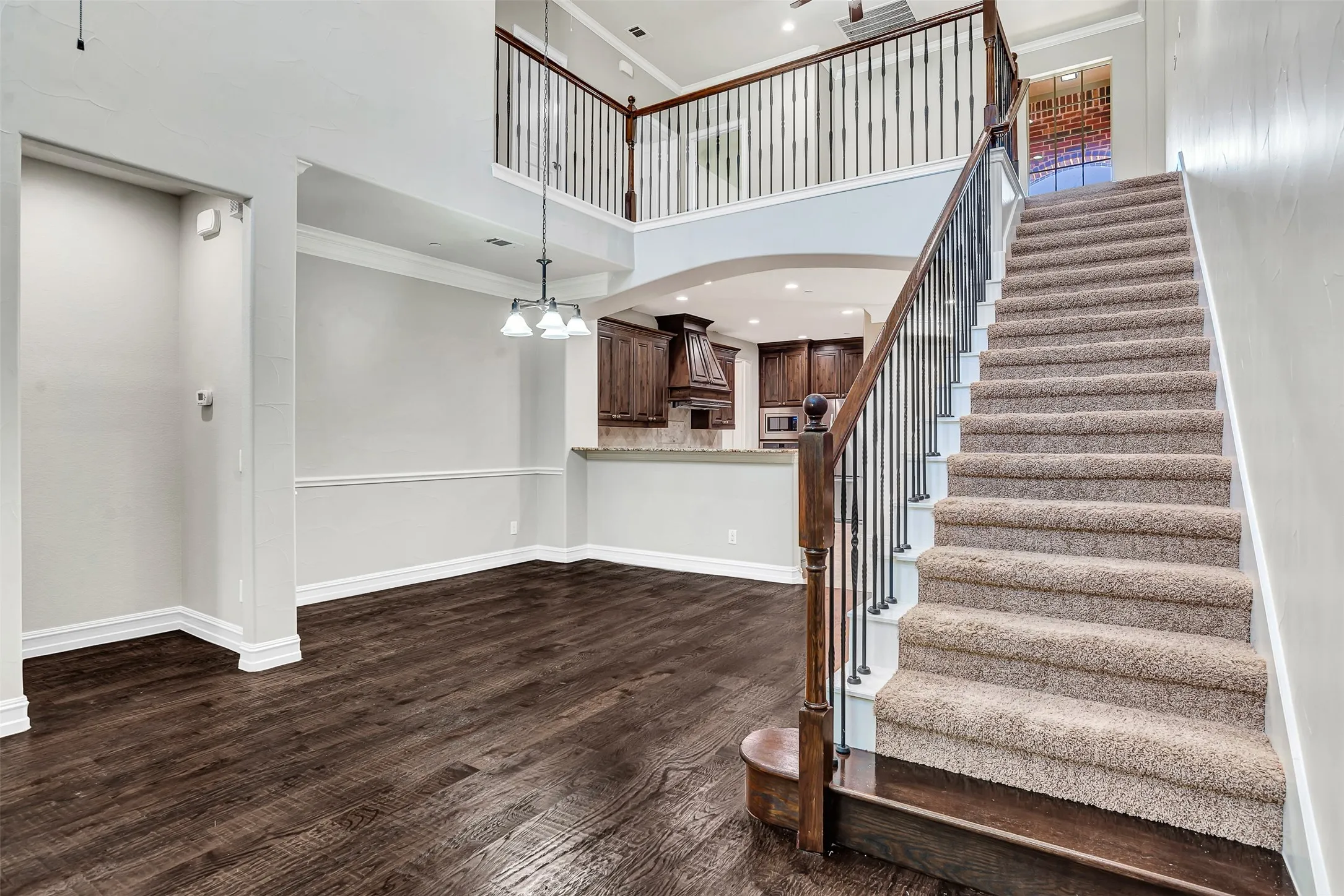 Soft carpet lines the stairs that lead to the game room and bedrooms above.