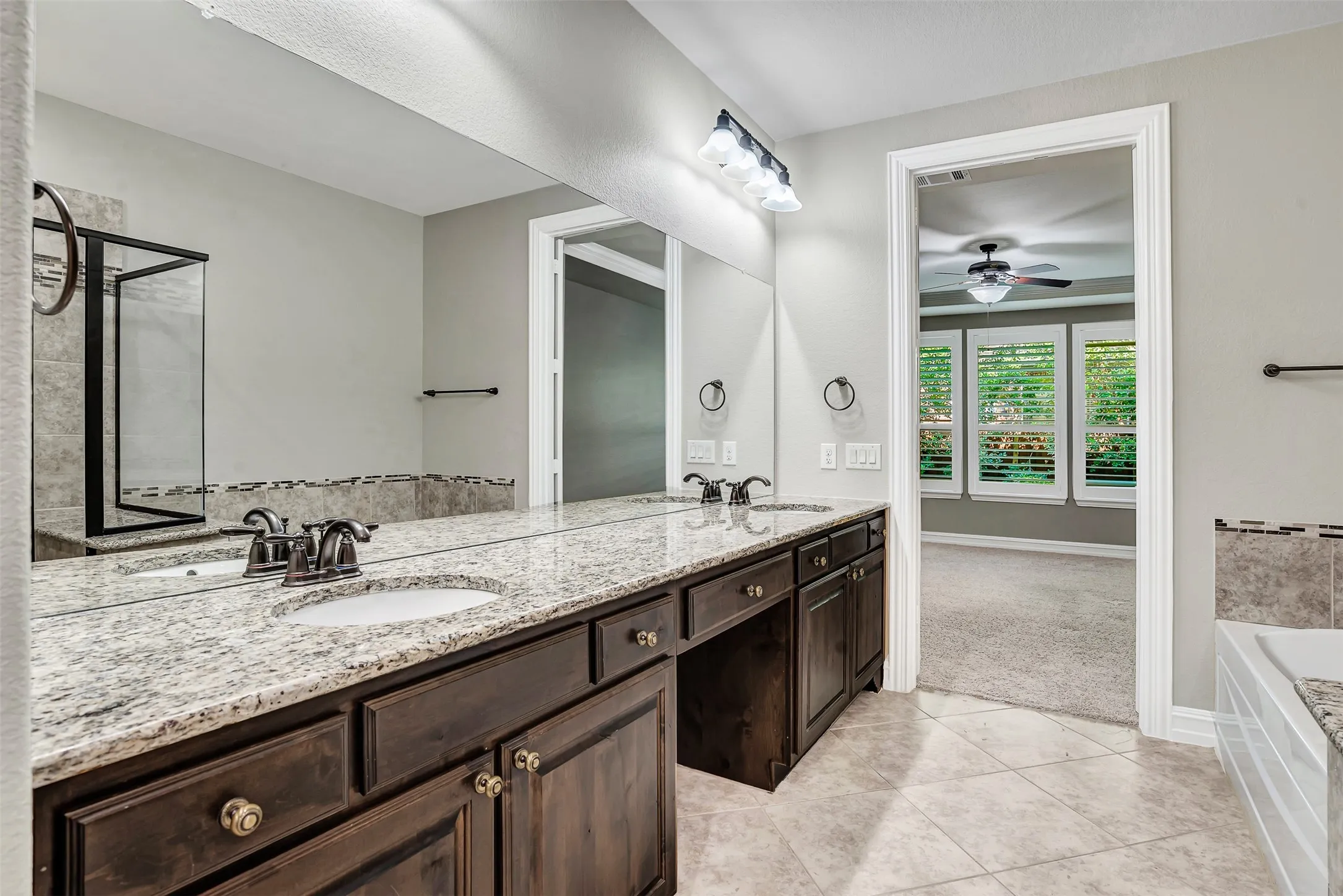 The massive vanity means you will have plenty of room for more than one person to get ready for work in the morning, or an evening out. A make up area has room for a chair!
