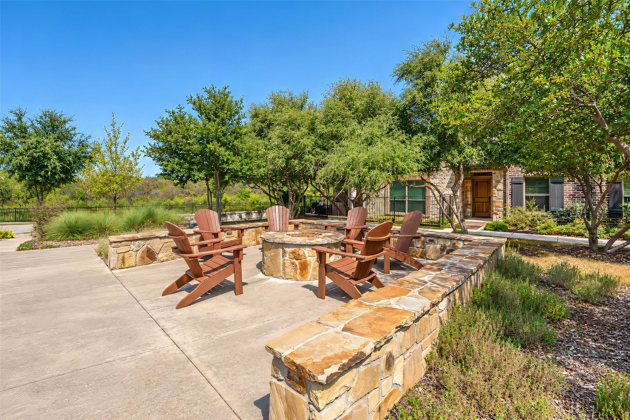 community fire pit and sitting area. This one is just behind the townhouse and offers extra parking as well.