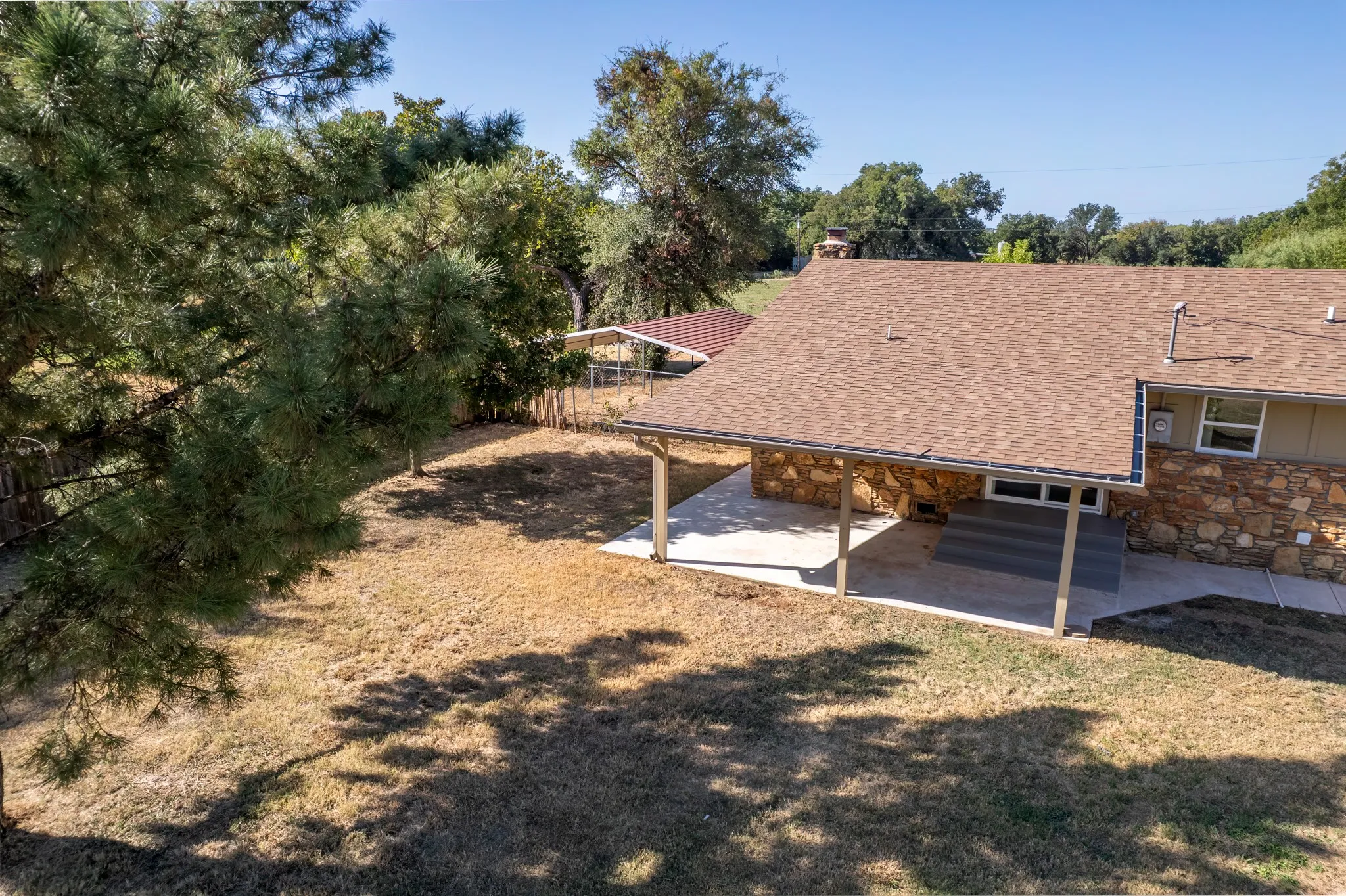 Backyard with covered patio